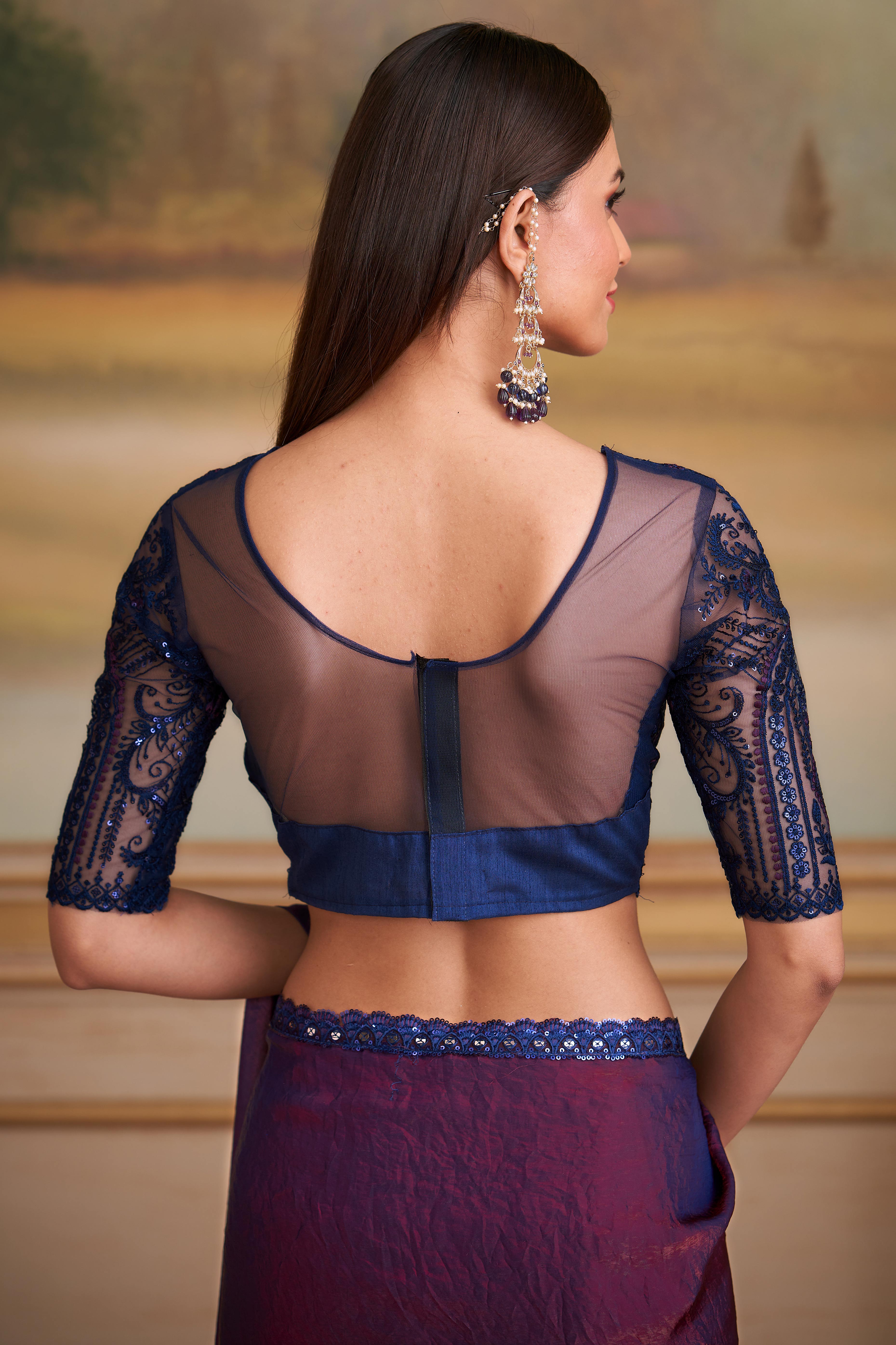 Opulent Wine Shade Twilight Georgette Saree Adorned With Floral Sequins Embroidered Lace Border
