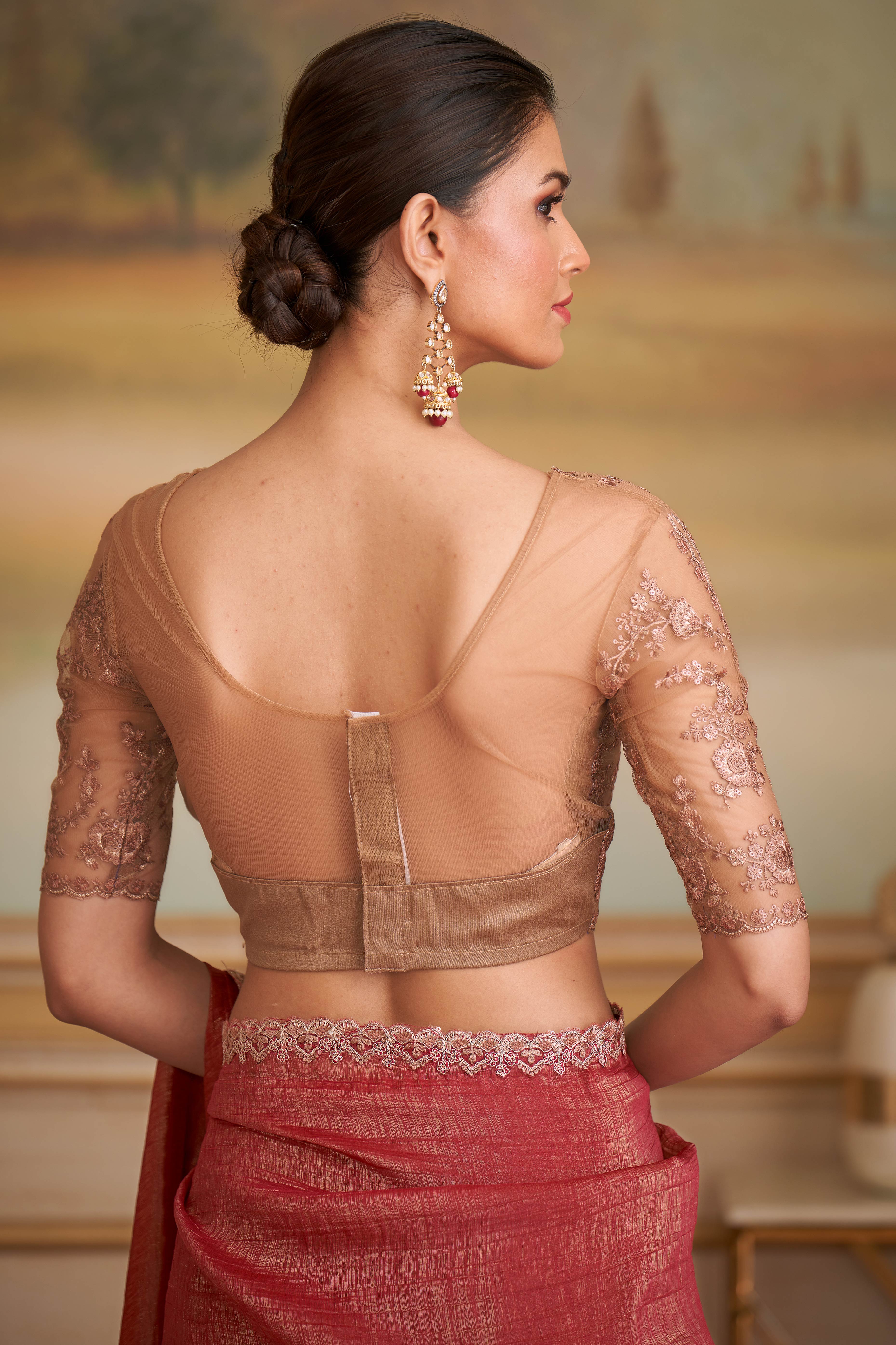 Graceful Brick Red Georgette Saree Adorned With Floral Sequins Embroidered Lace Border Work