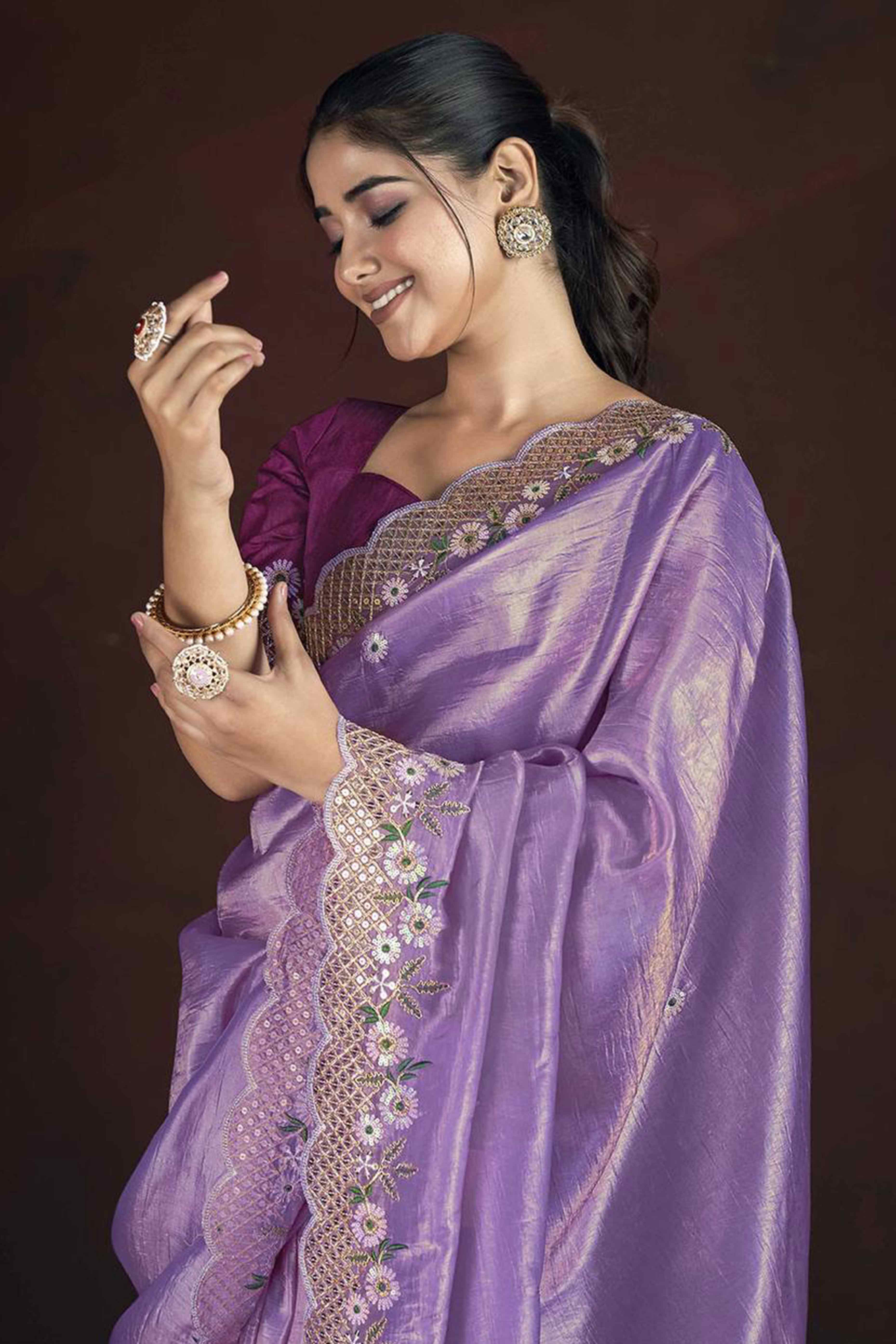 Lavender Organza Saree with Embroidery on the Edges for a Graceful Contemporary Look