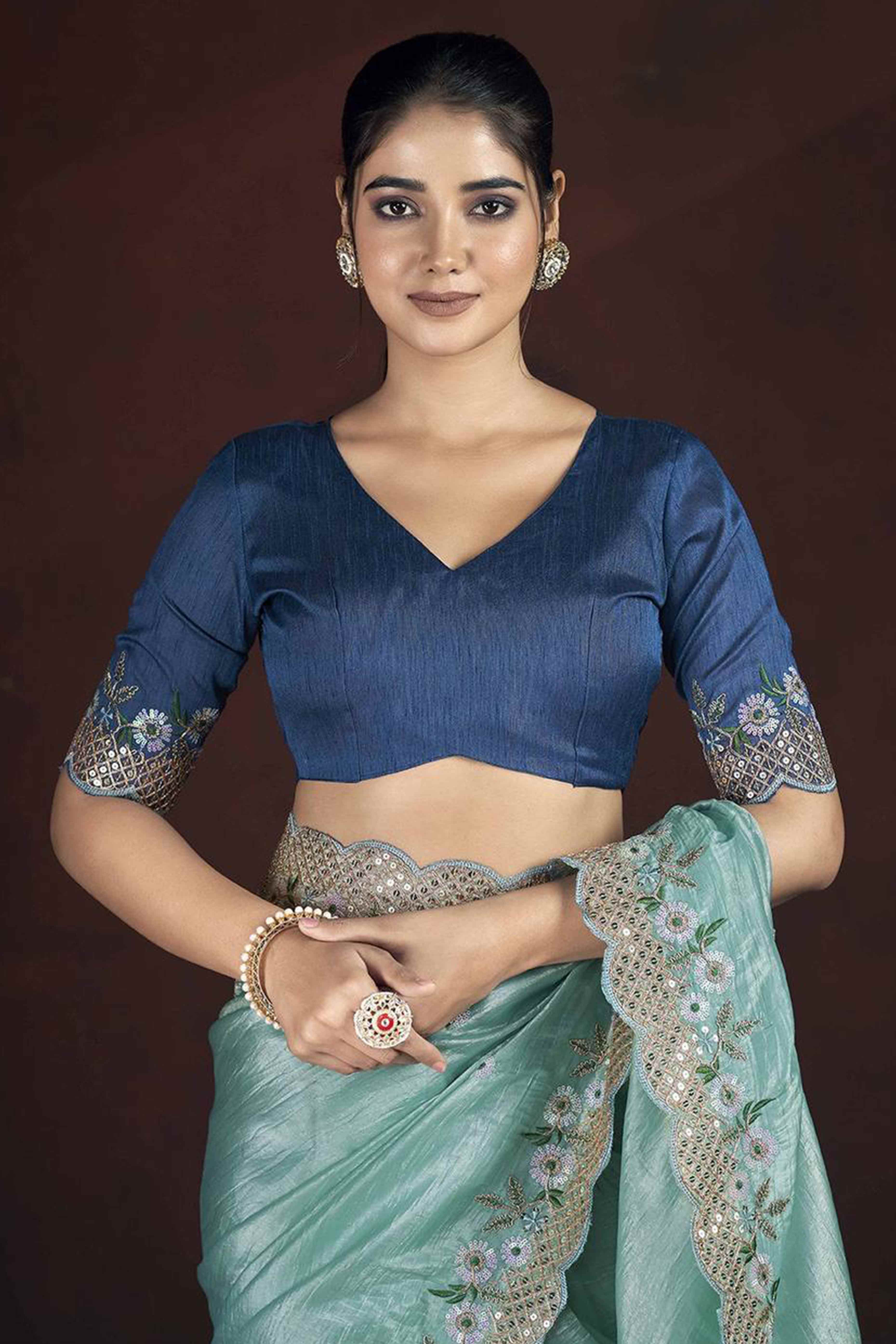 Sky Blue Organza Saree with Embroidery on the Edges for a Graceful Contemporary Look