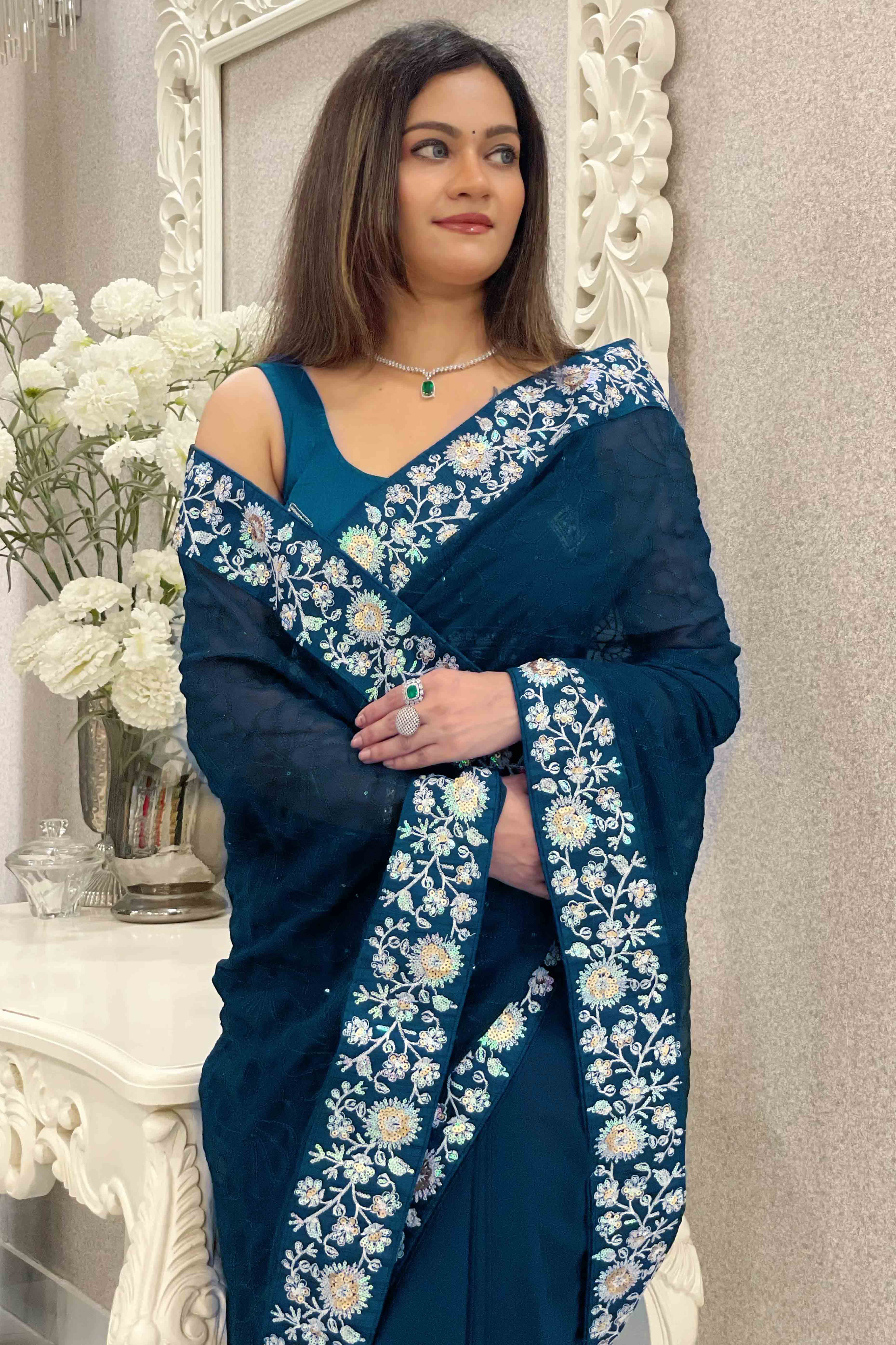 Teal Georgette Saree Featuring Fine Sequin Embroidery for a Glam Look
