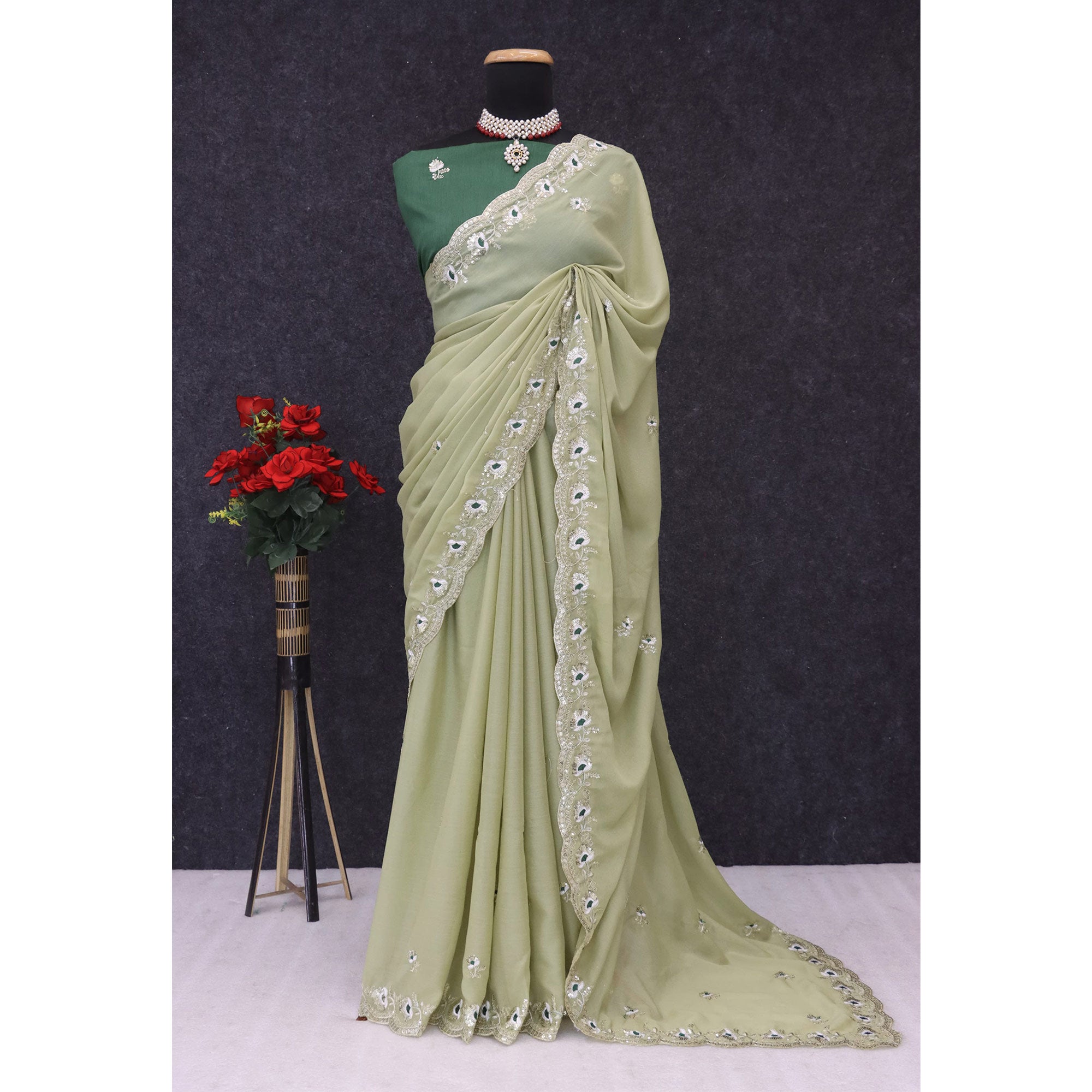Green Georgette Silk Saree With Floral Sequin Embroidery & Graceful Cutwork Detailing Border