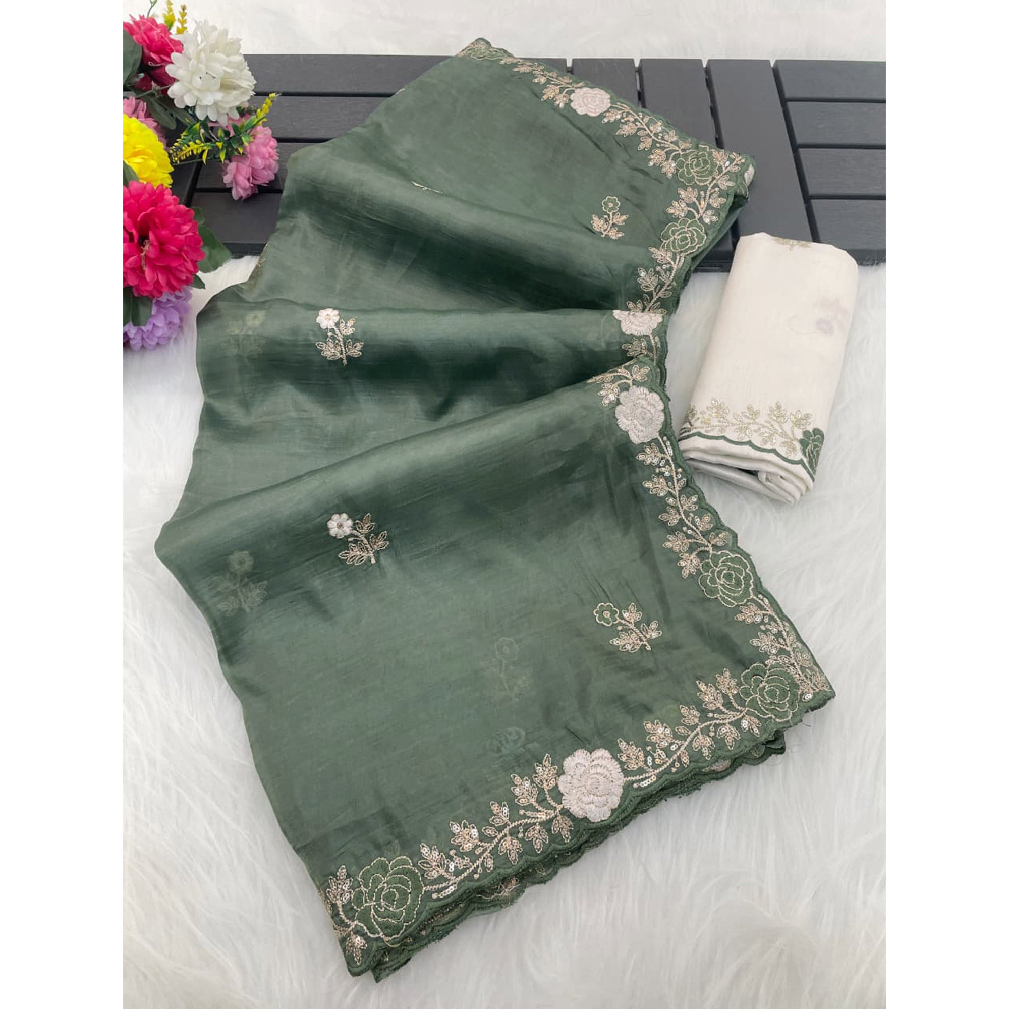 Green Lightweight Georgette Crush Saree Adorned with Delicate Floral Embroidery