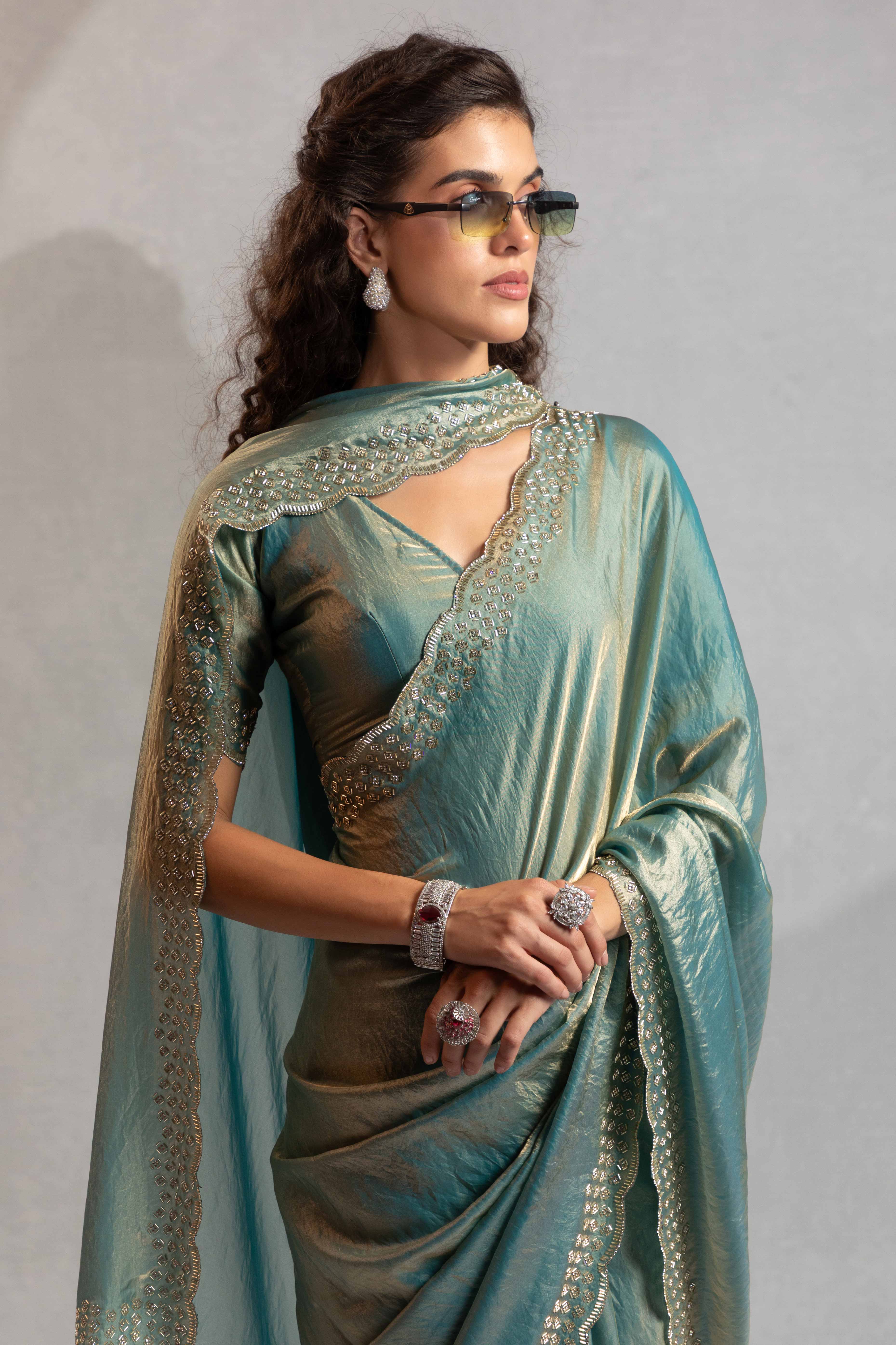 Sea Green Satin Saree with Glamorous Stone Embellishment
