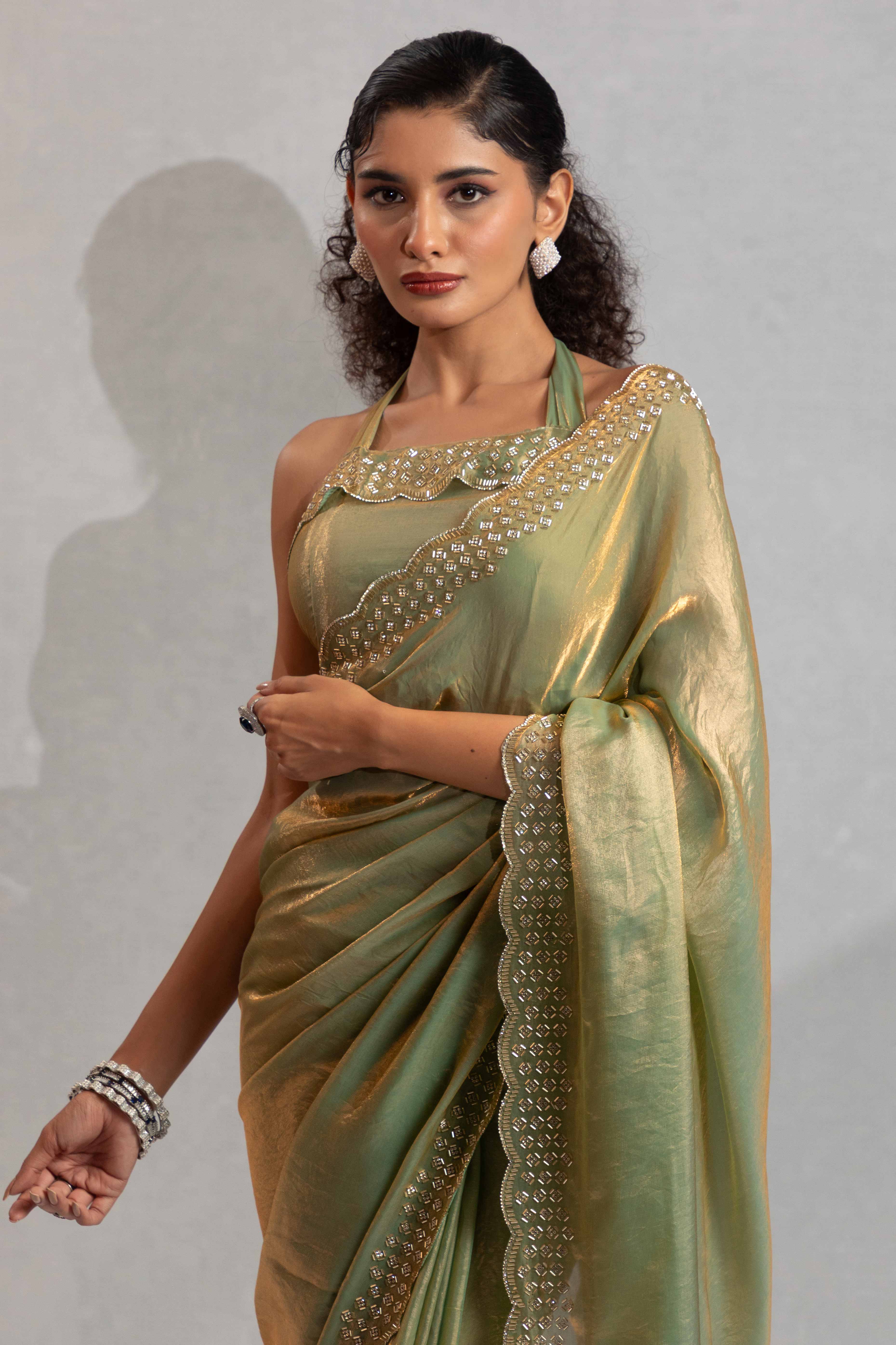 Pista Green Satin Saree with Glamorous Stone Embellishment