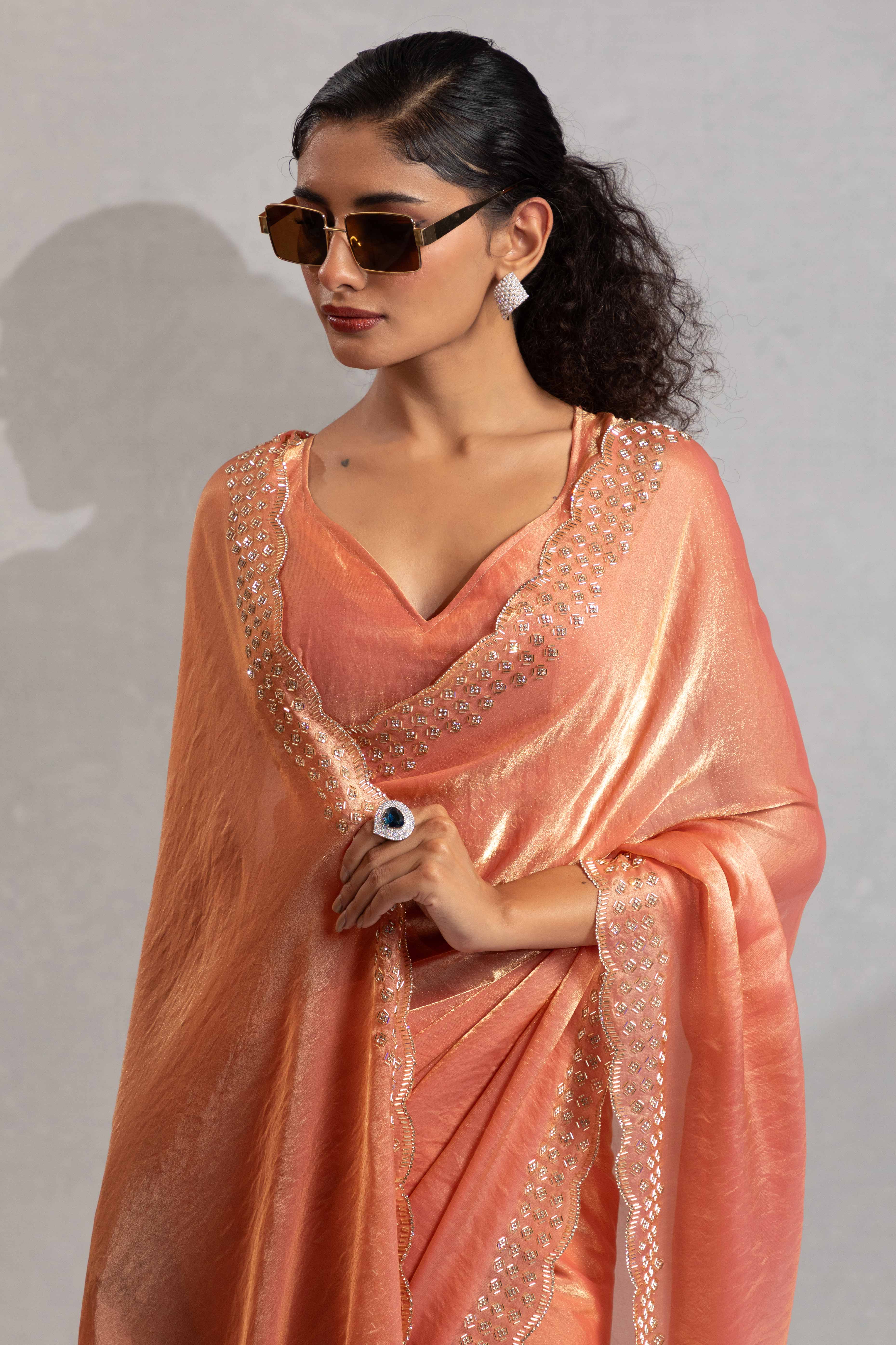Coral Peach Satin Saree with Glamorous Stone Embellishment