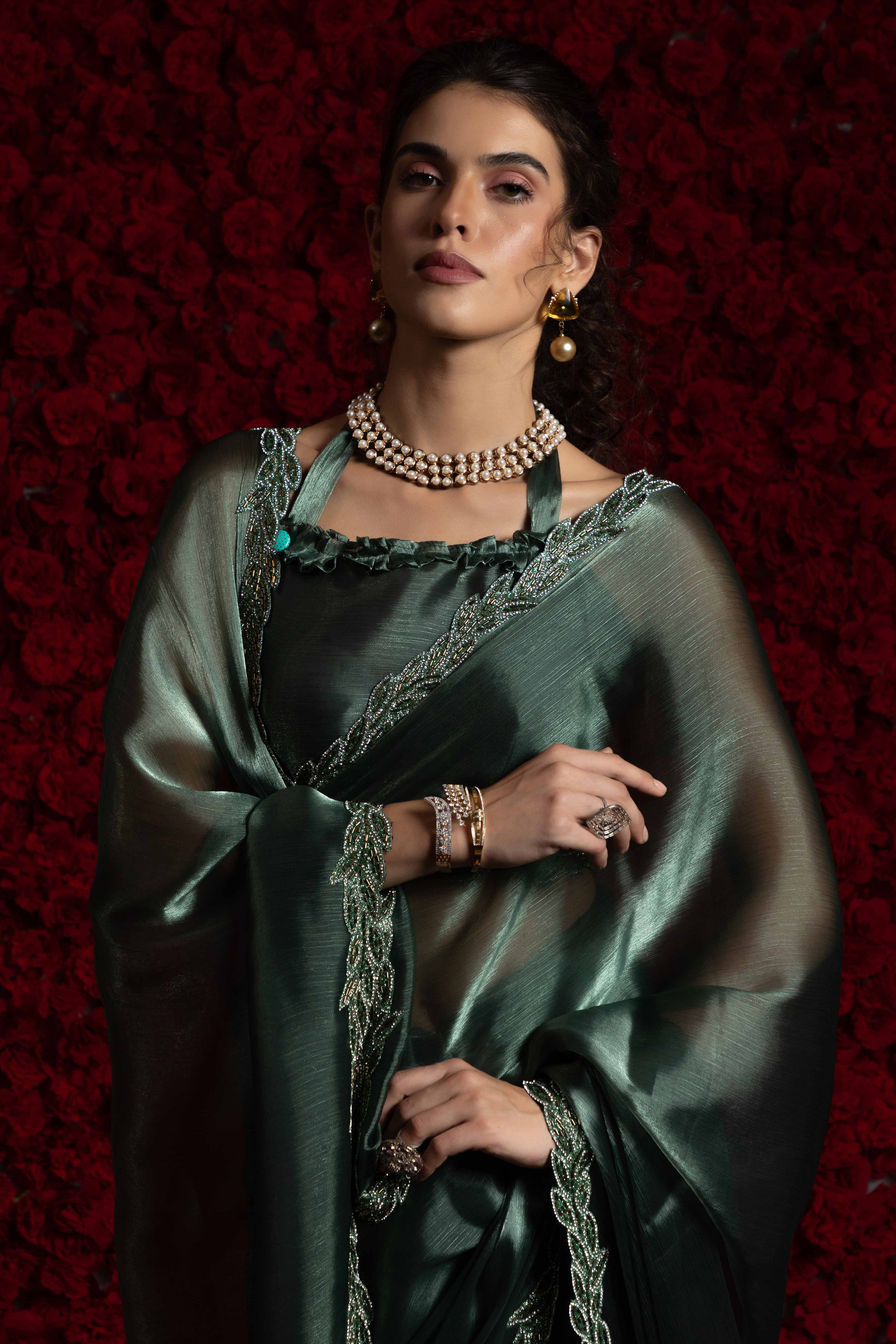 Emerald Green Solid Tissue Chiffon Saree Accented With Elegant Zarkan Work Border