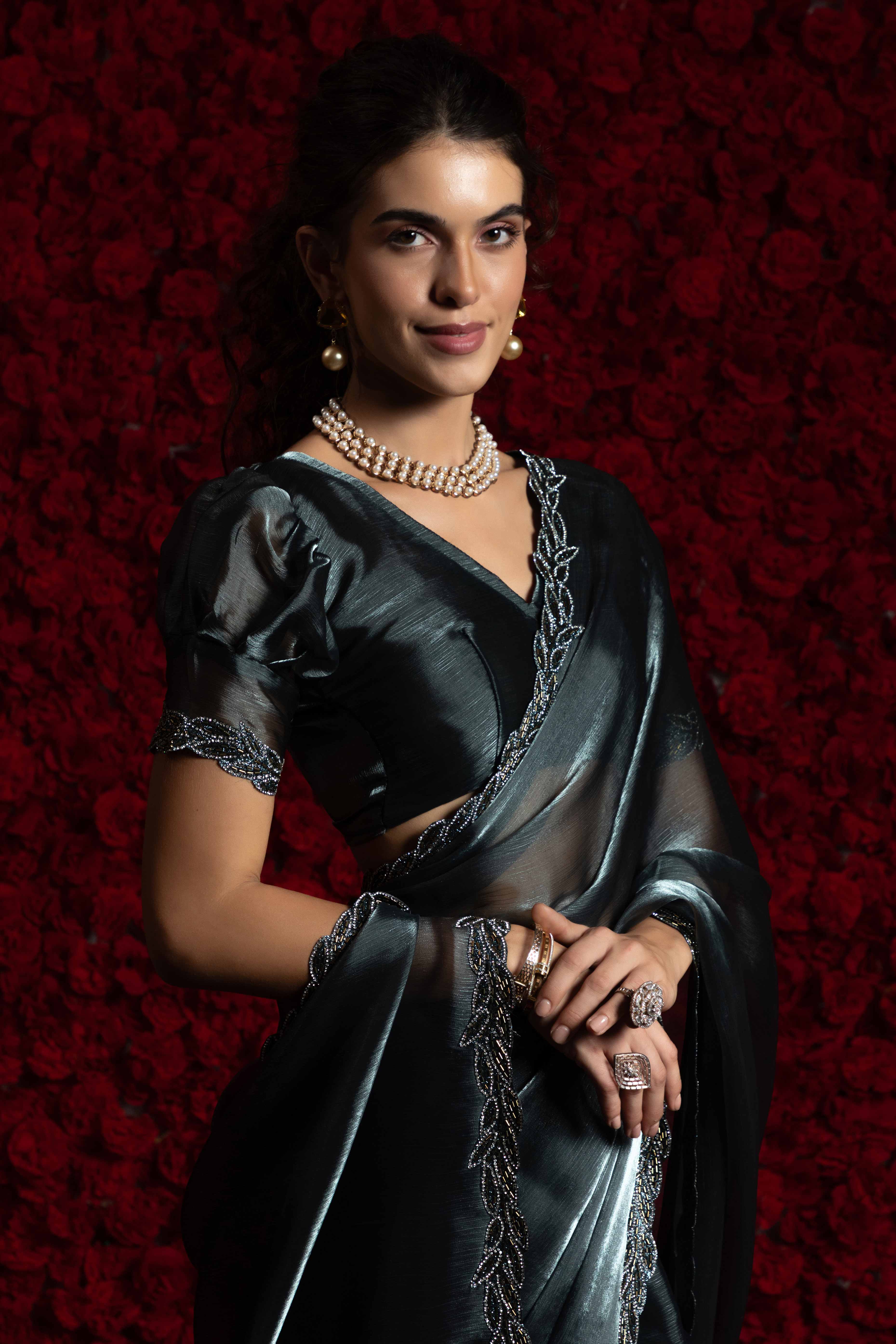 Grey Solid Tissue Chiffon Saree Accented With Elegant Zarkan Work Border