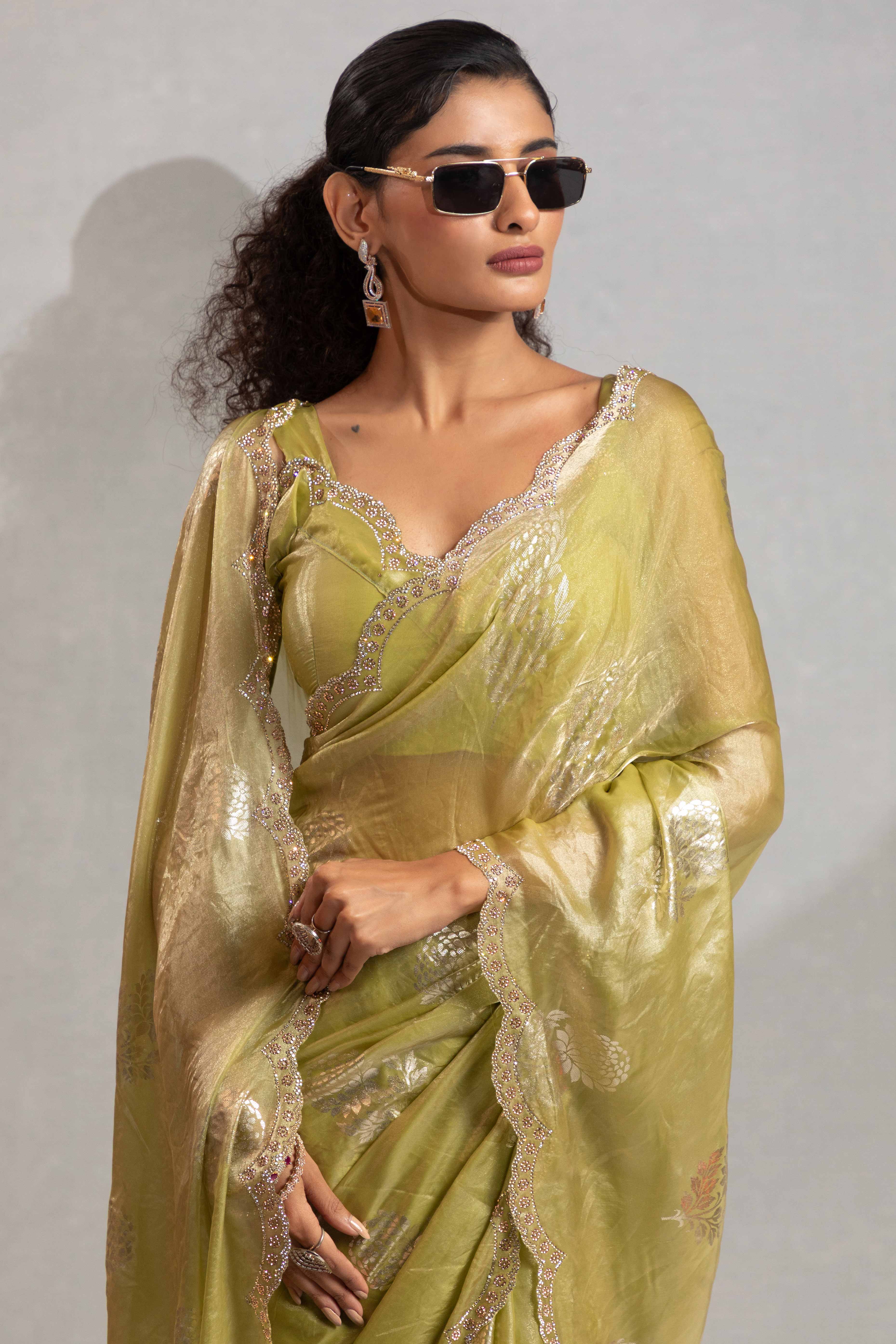 Green Satin Silk Saree Showcasing Elegant Floral Foil Prints & Dazzling Zarkan Work