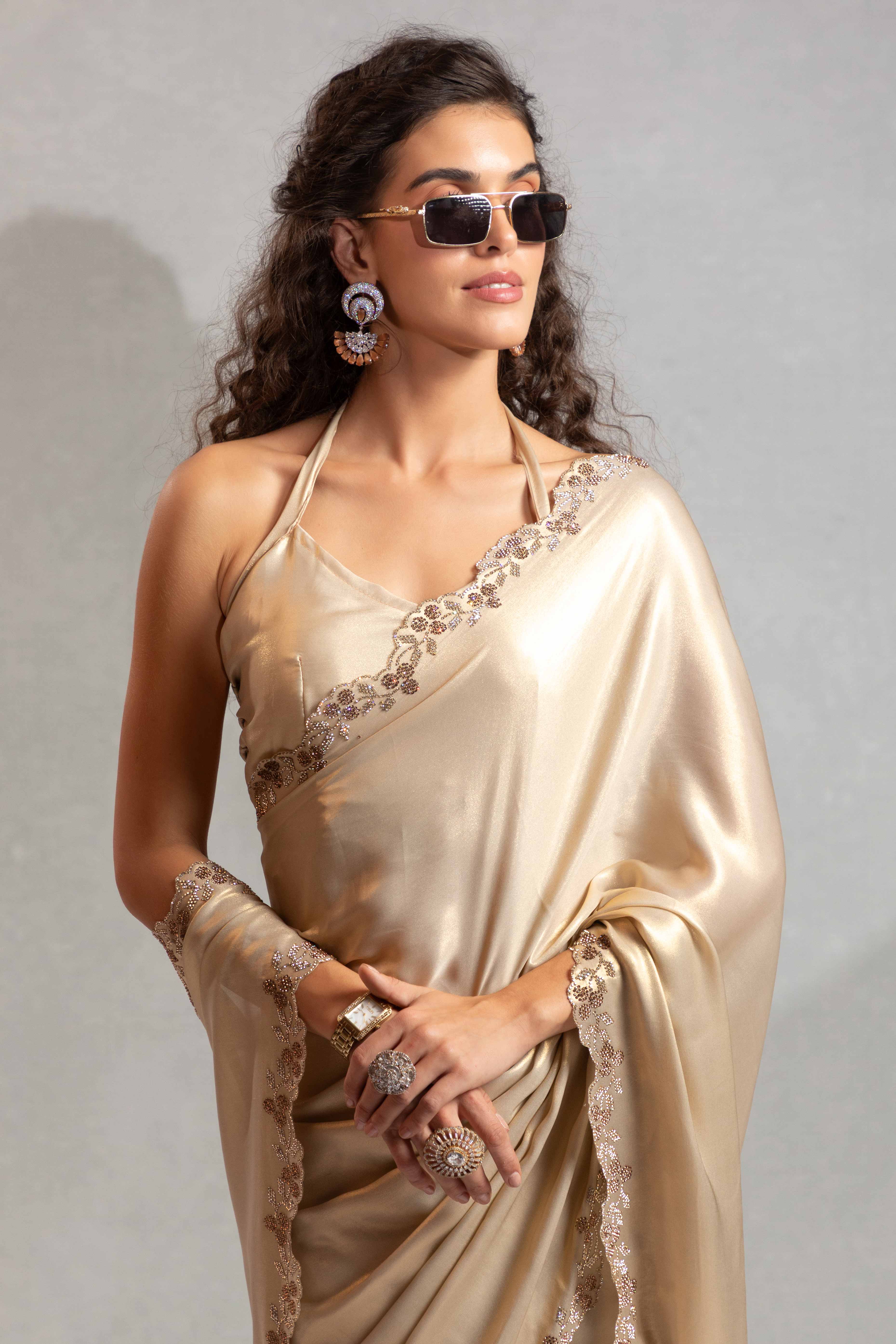 Beige Satin Georgette Saree Adorned With Subtle Foil Finish & A Sparkling Zarkan Work Border