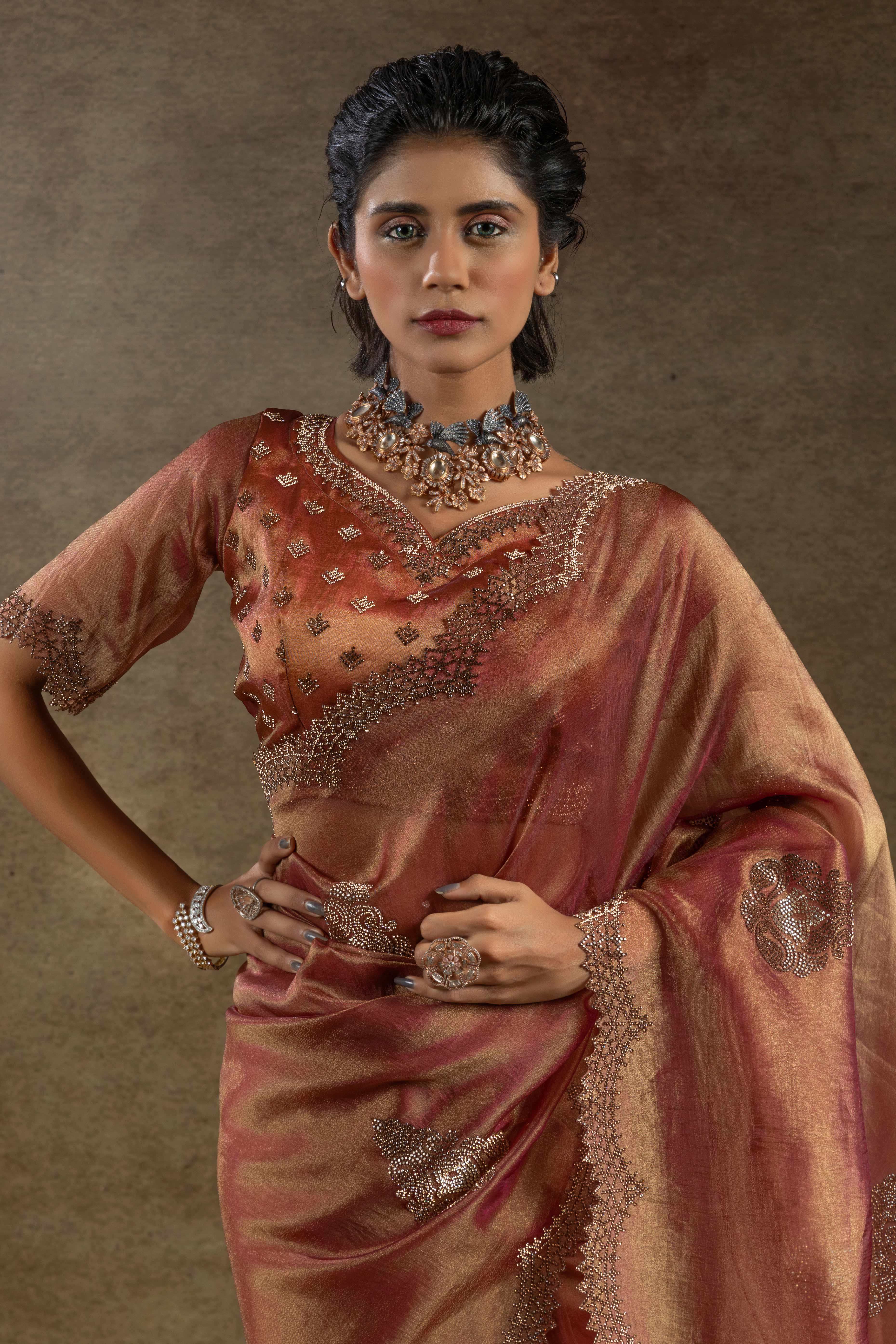 Peach Banarasi Silk Saree with Stone Embellishments Perfect for Party Wear