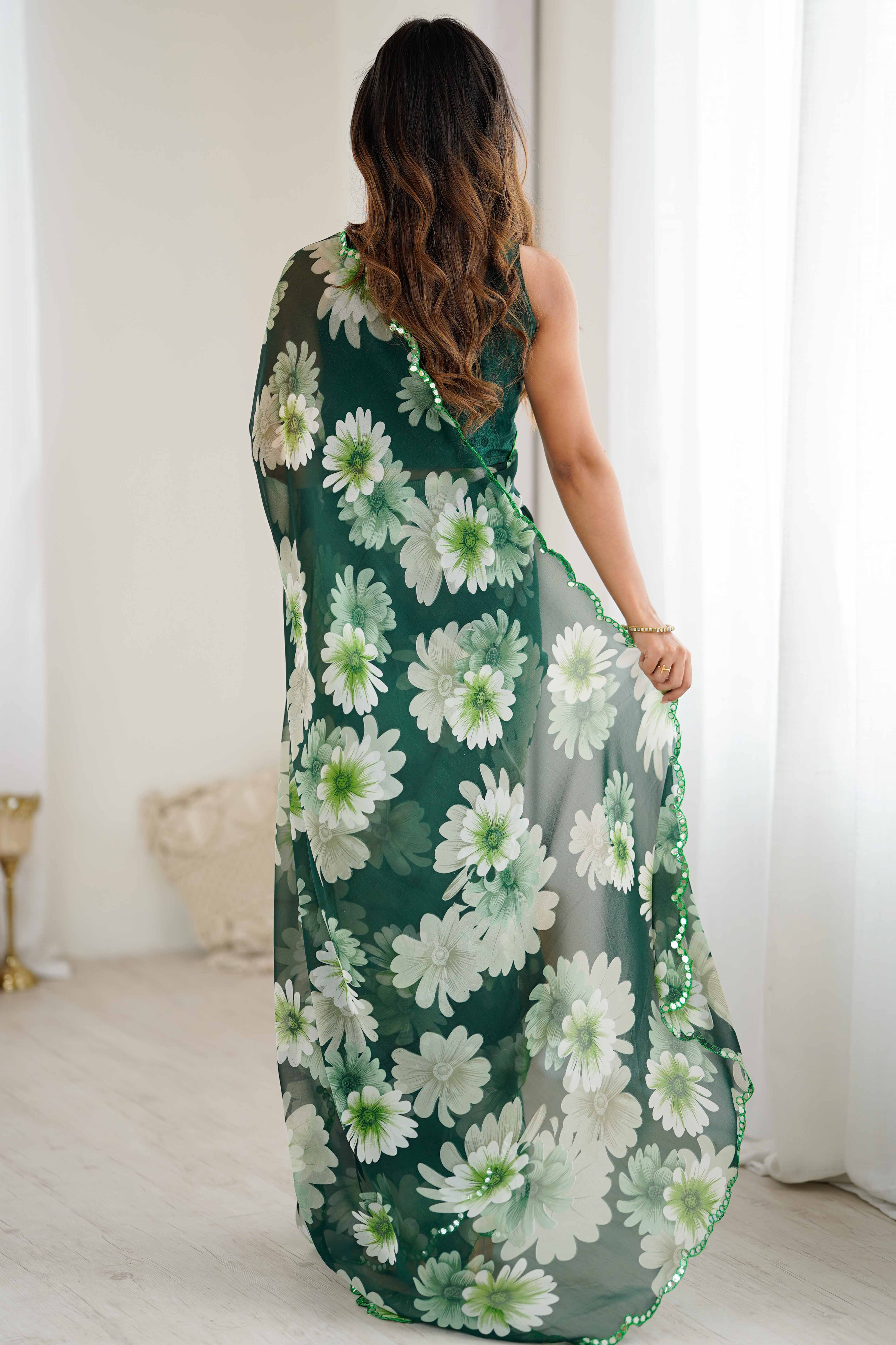 Green Georgette Saree Featuring Floral Prints & Shimmering Mirror Work Border
