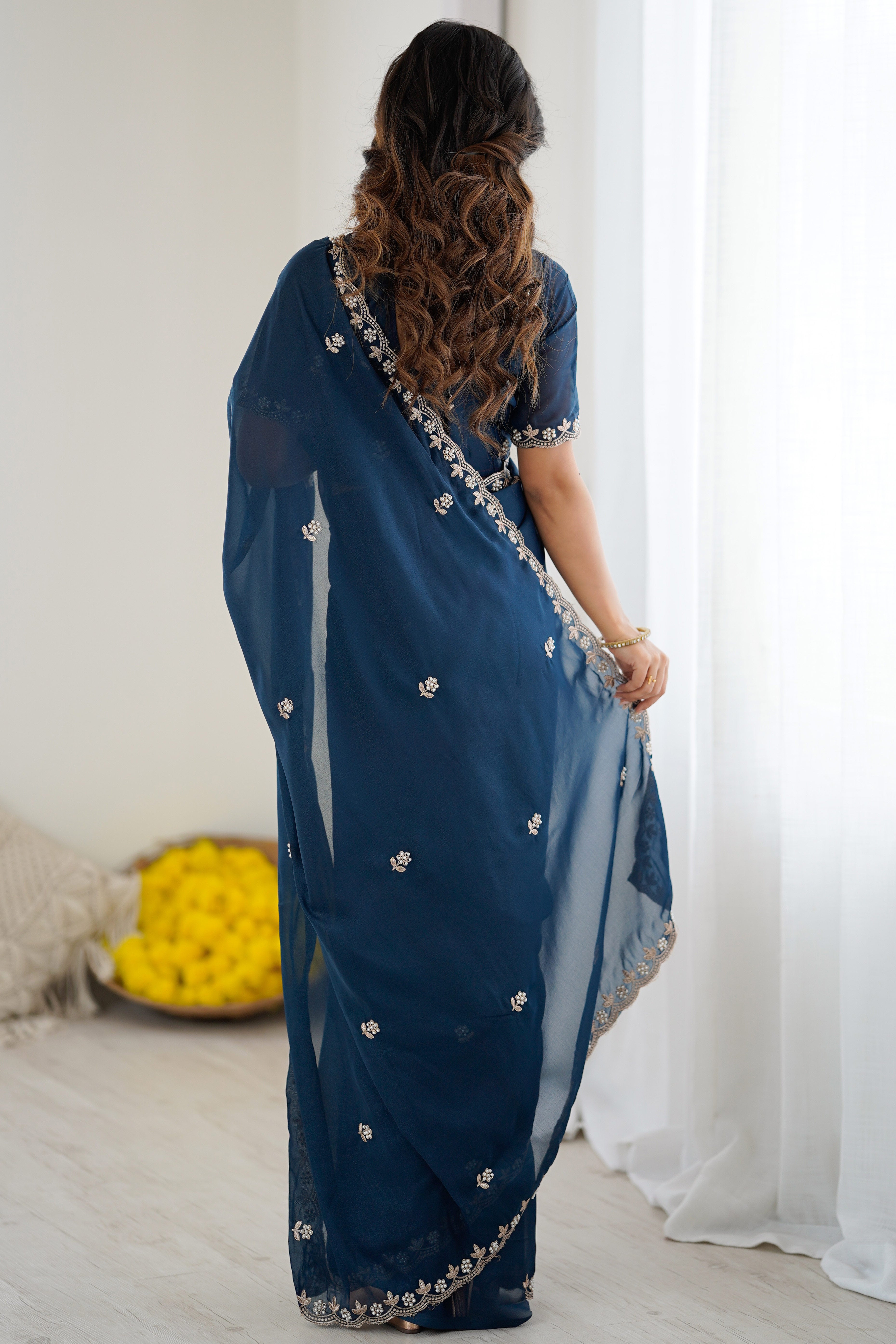 Blue Partywear Star Georgette Saree Adorned with Floral Embroidery and Beads Work
