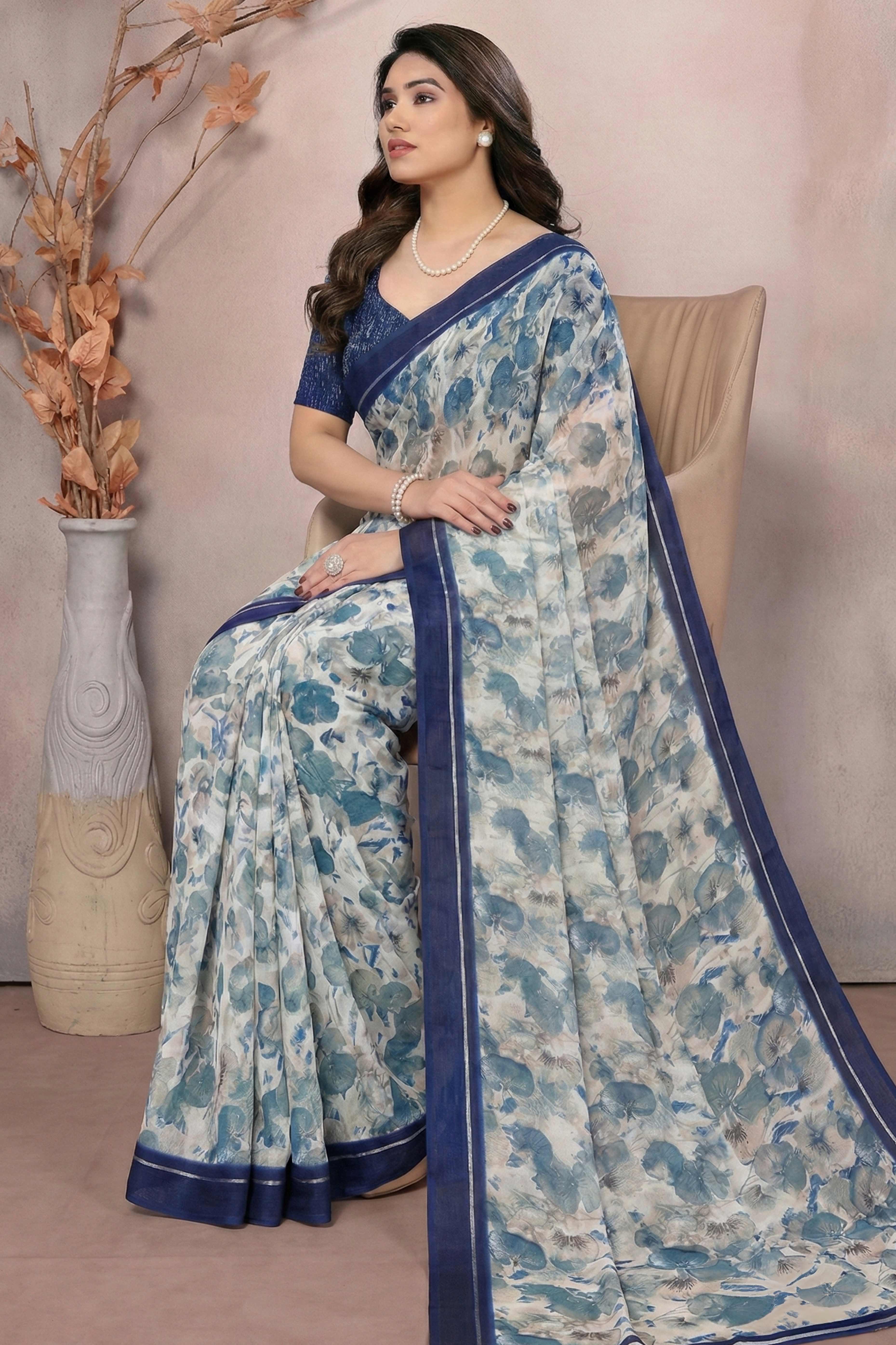 Timeless Blue Leaf Printed Moss Saree With A Sophisticated Satin Patta Border