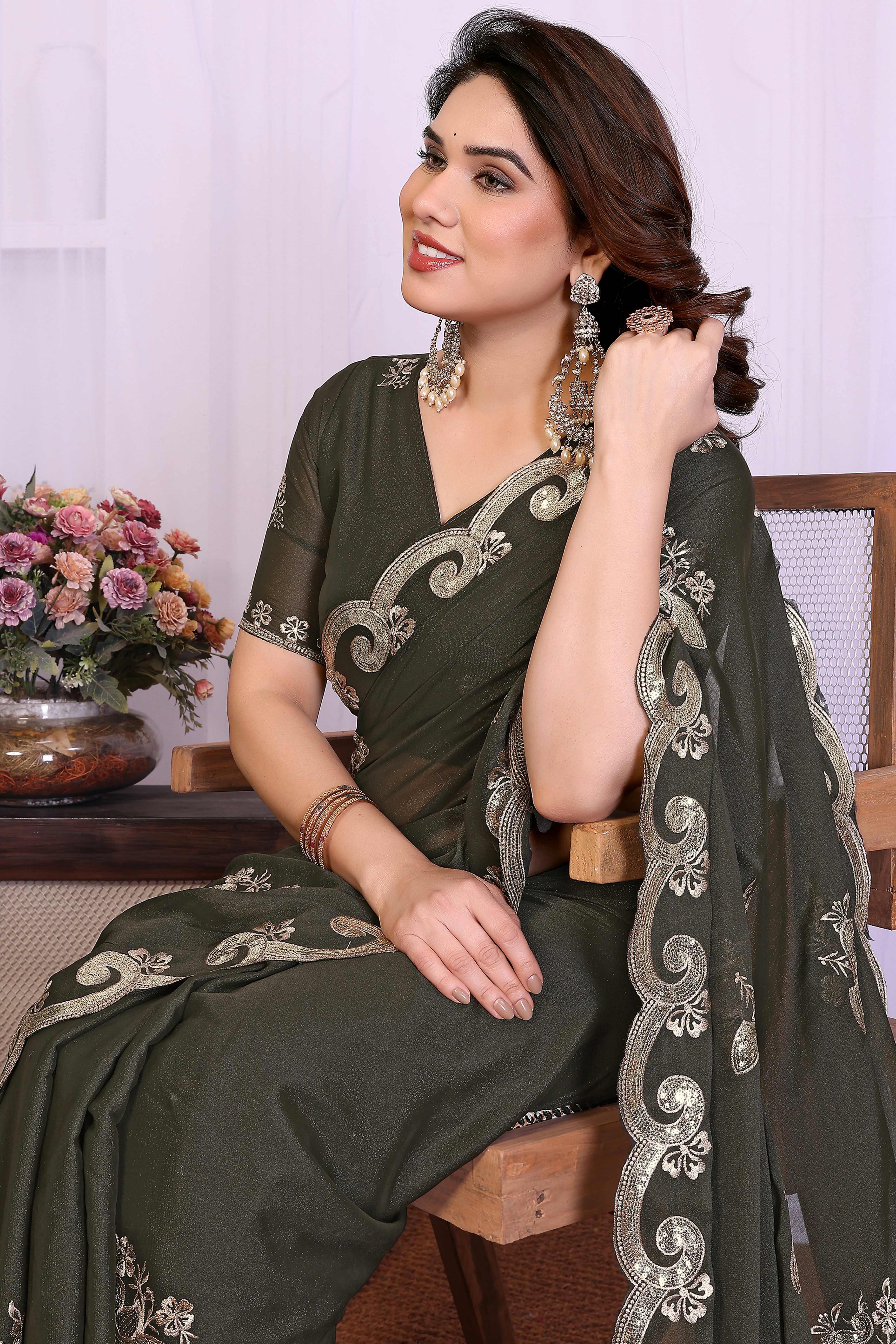 Charming Mehendi Green Floral & Peacock Motif Georgette Saree Enhanced With Sequins Embroidery