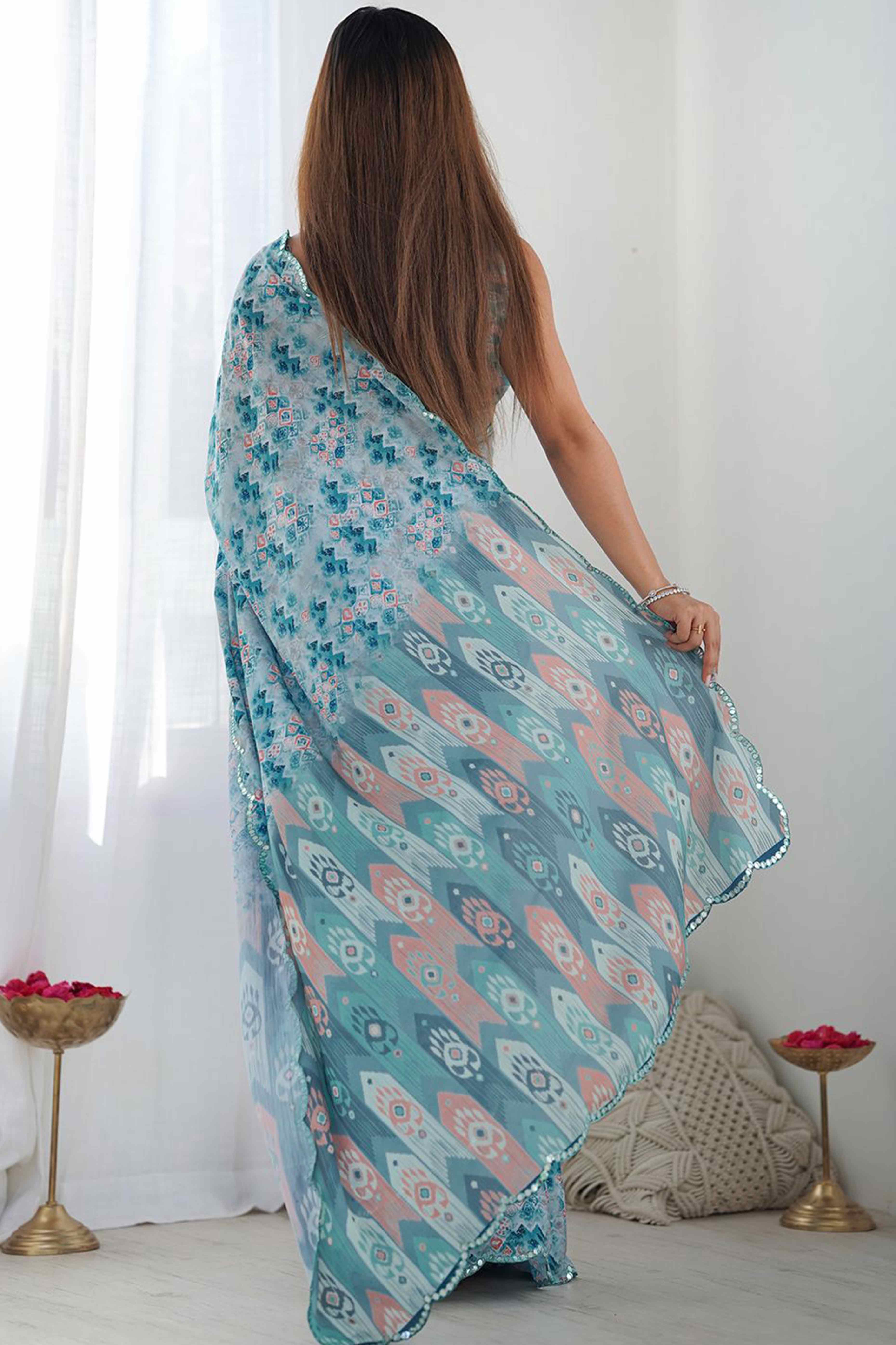 Light Blue Geometric Digital Print Georgette Saree Enhanced With A Sparkling Lace Border