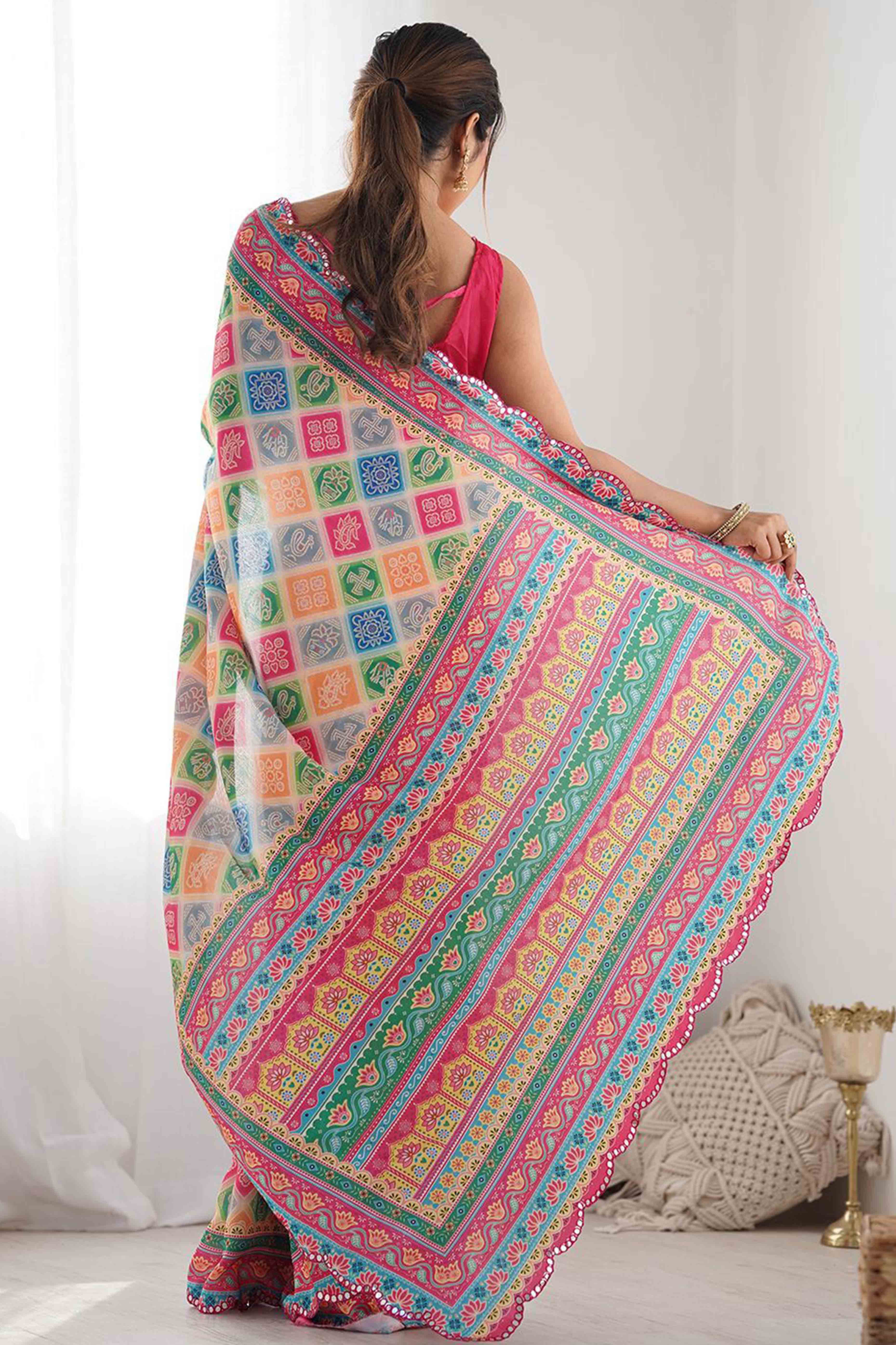 Multicolor Digital Print Georgette Saree Enhanced With A Sparkling Lace Border
