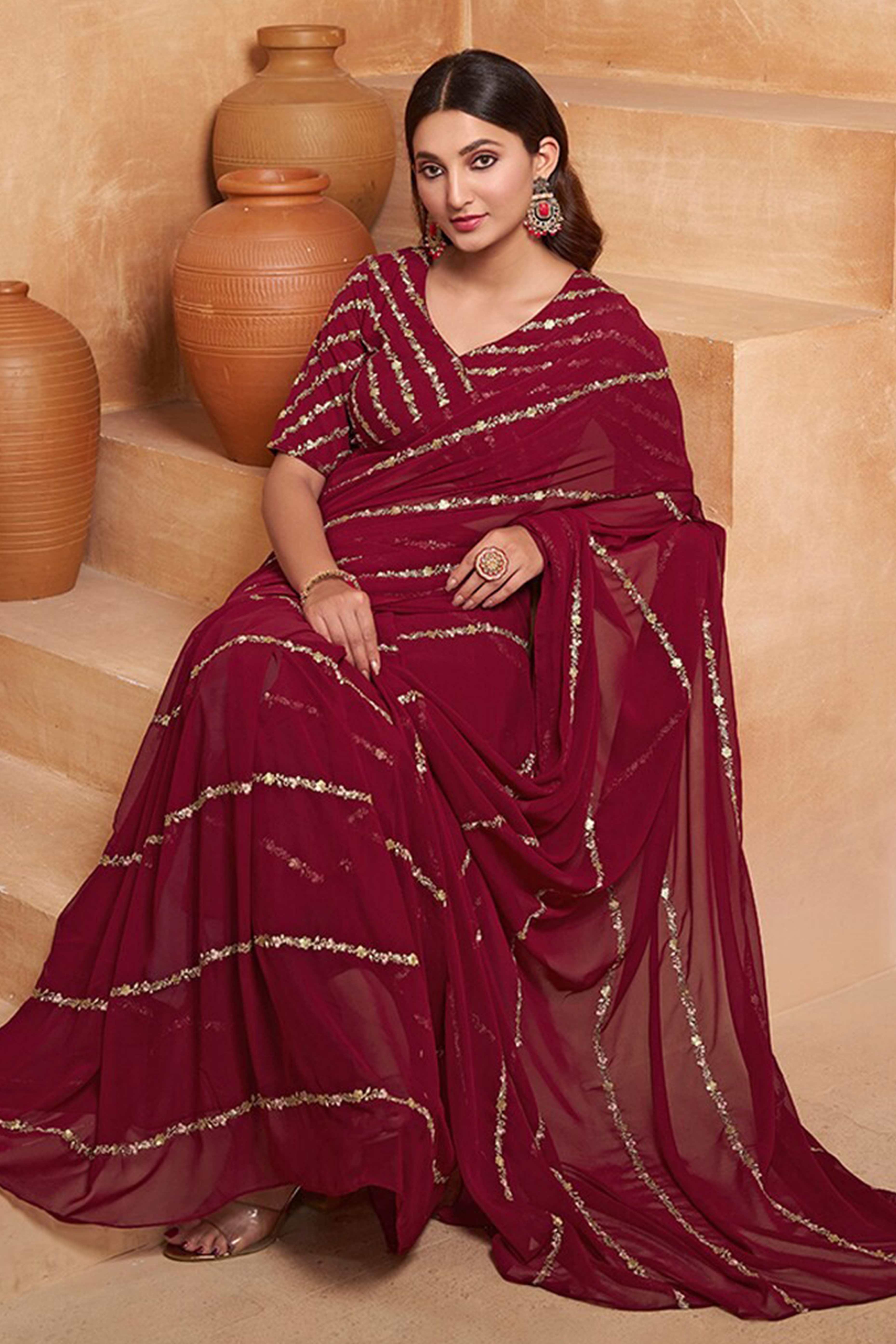Radiant Maroon Floral Georgette Saree Embellished With Fine Sequins Embroidery