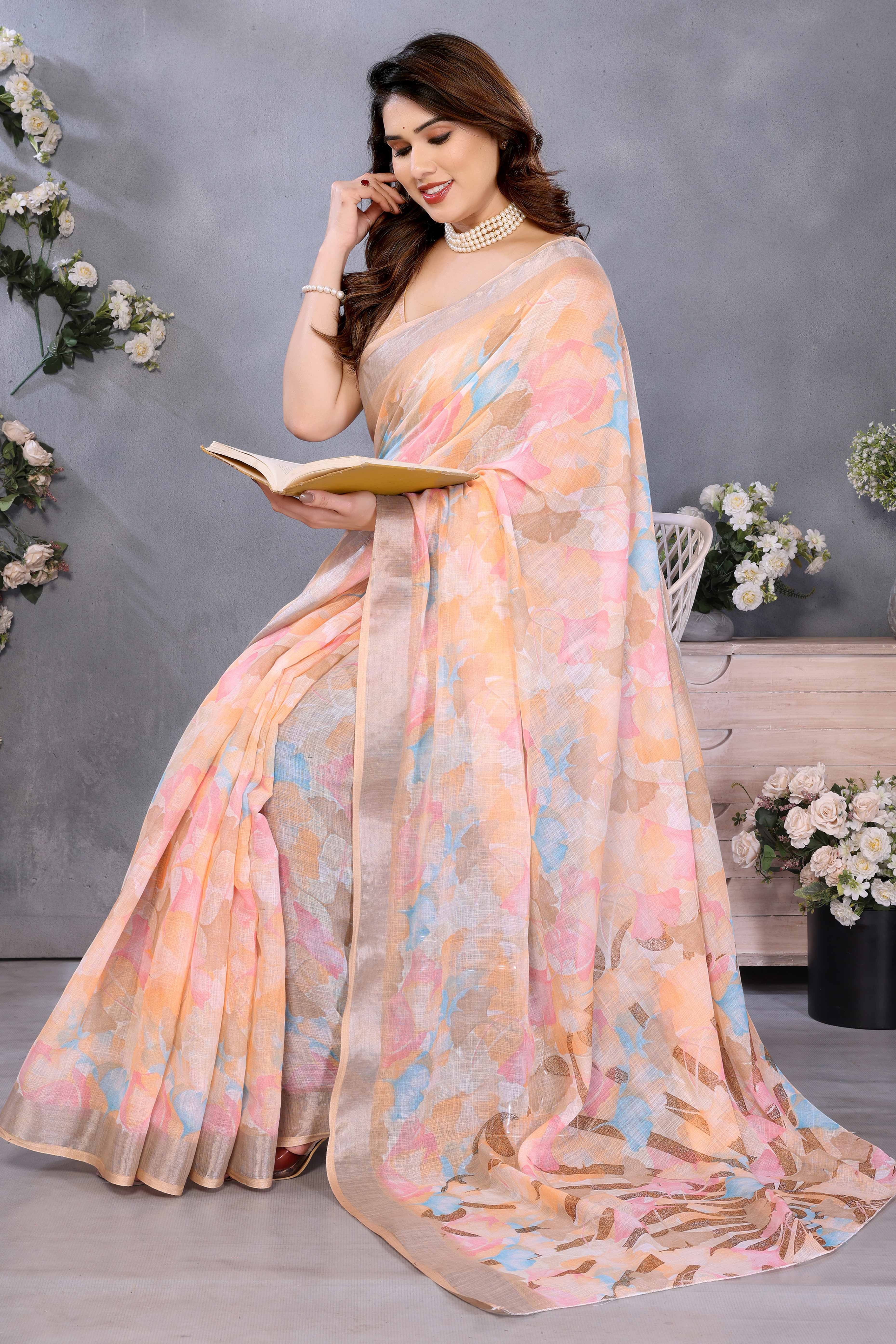 Orange Floral Printed Linen Saree Accented With A Classic Patta Border
