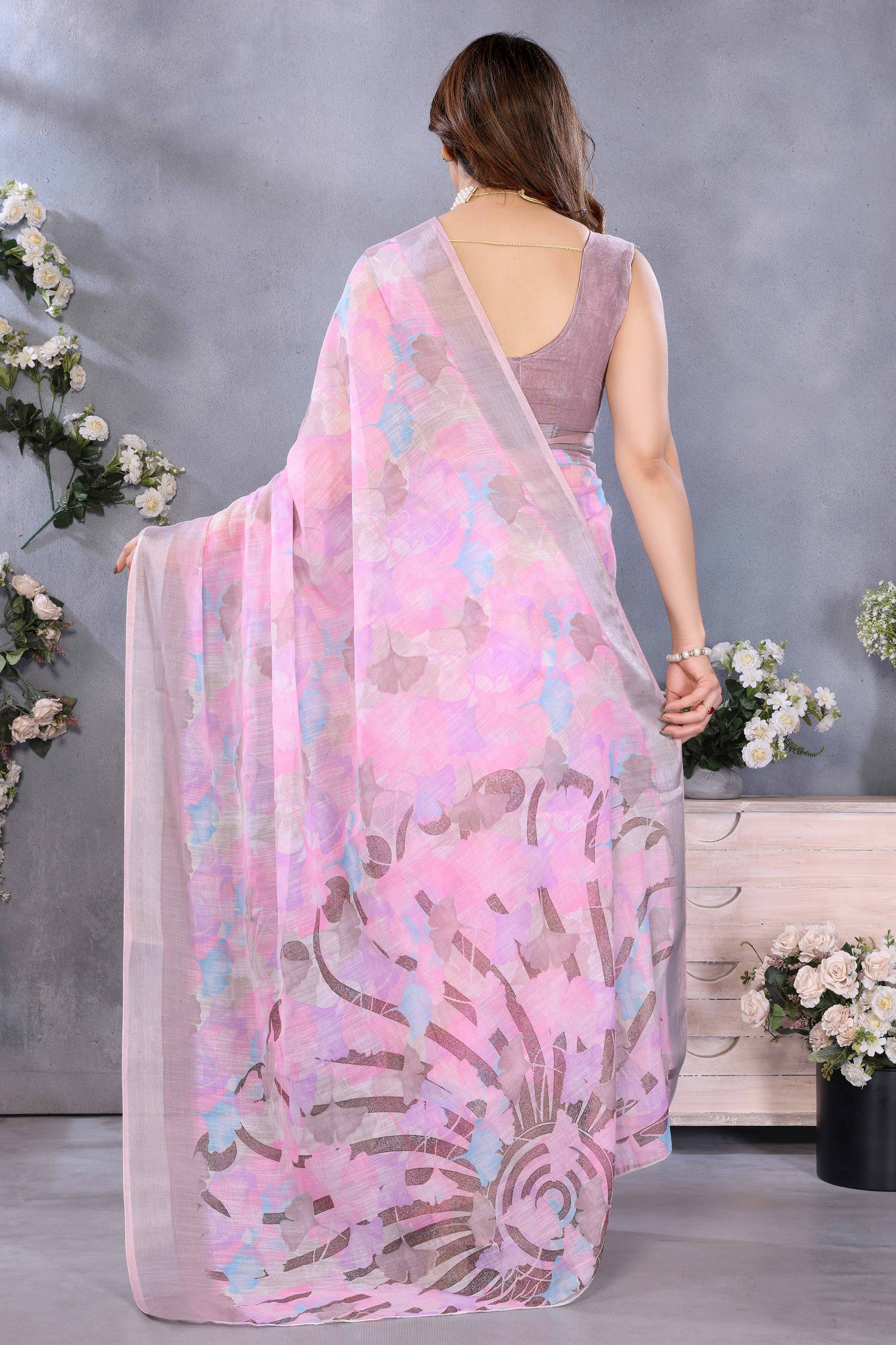 Pink Floral Printed Linen Saree Accented With A Classic Patta Border