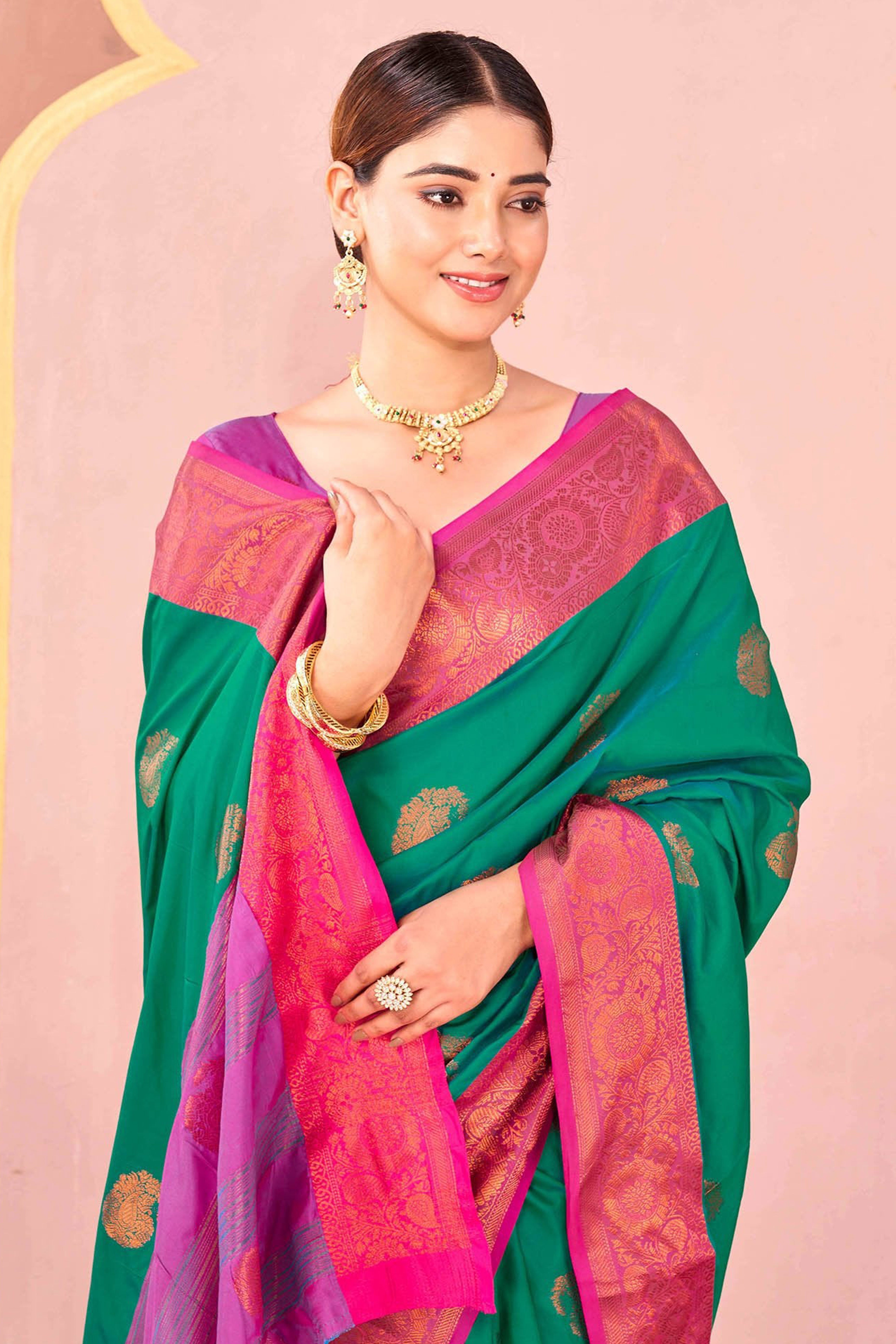 Teal Green Silk Blend Saree Adorned With Zari Woven Floral & Paisley Design