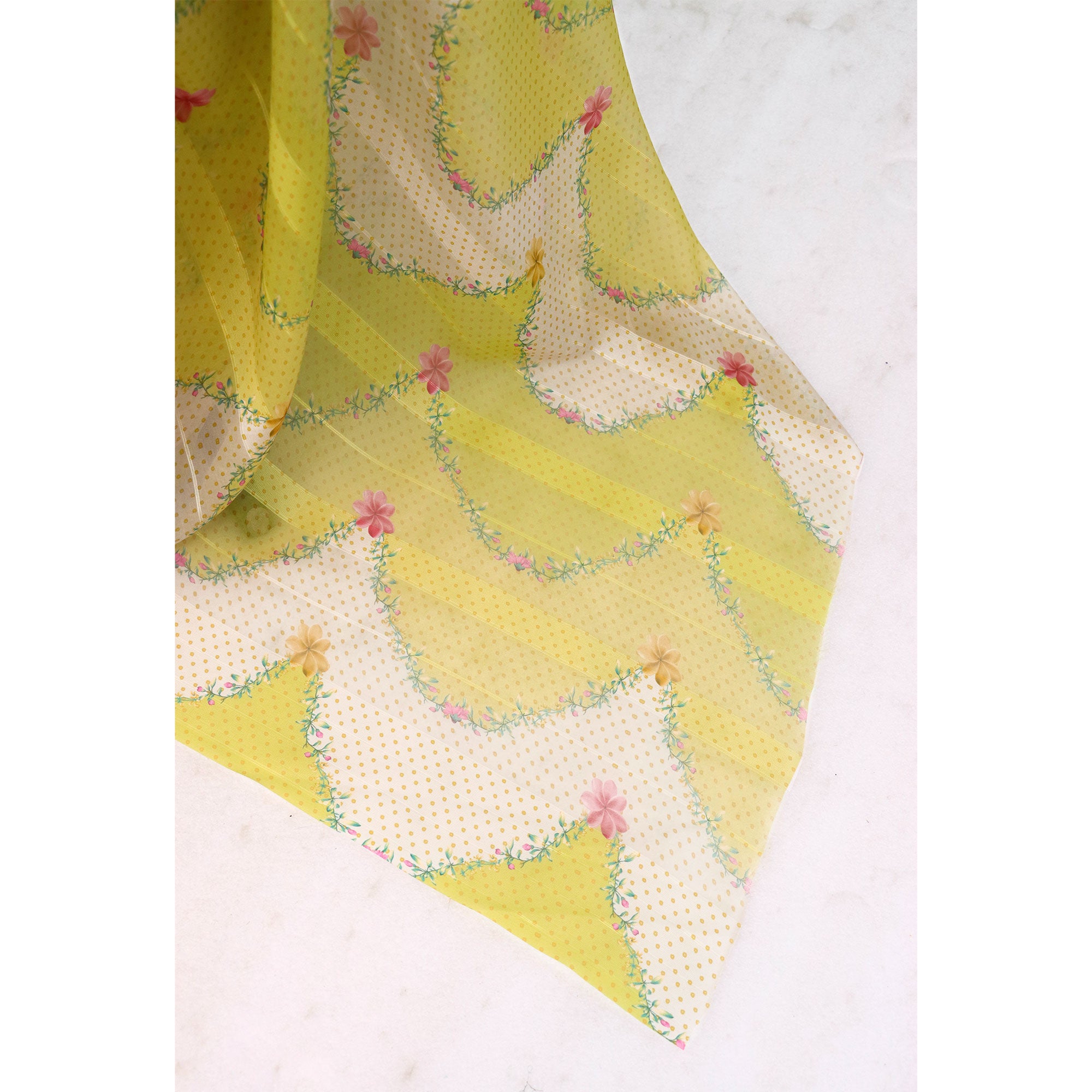 Lemon Yellow Bloom Floral Digital Printed Georgette Saree Accentuated With Graceful Zari Stripes