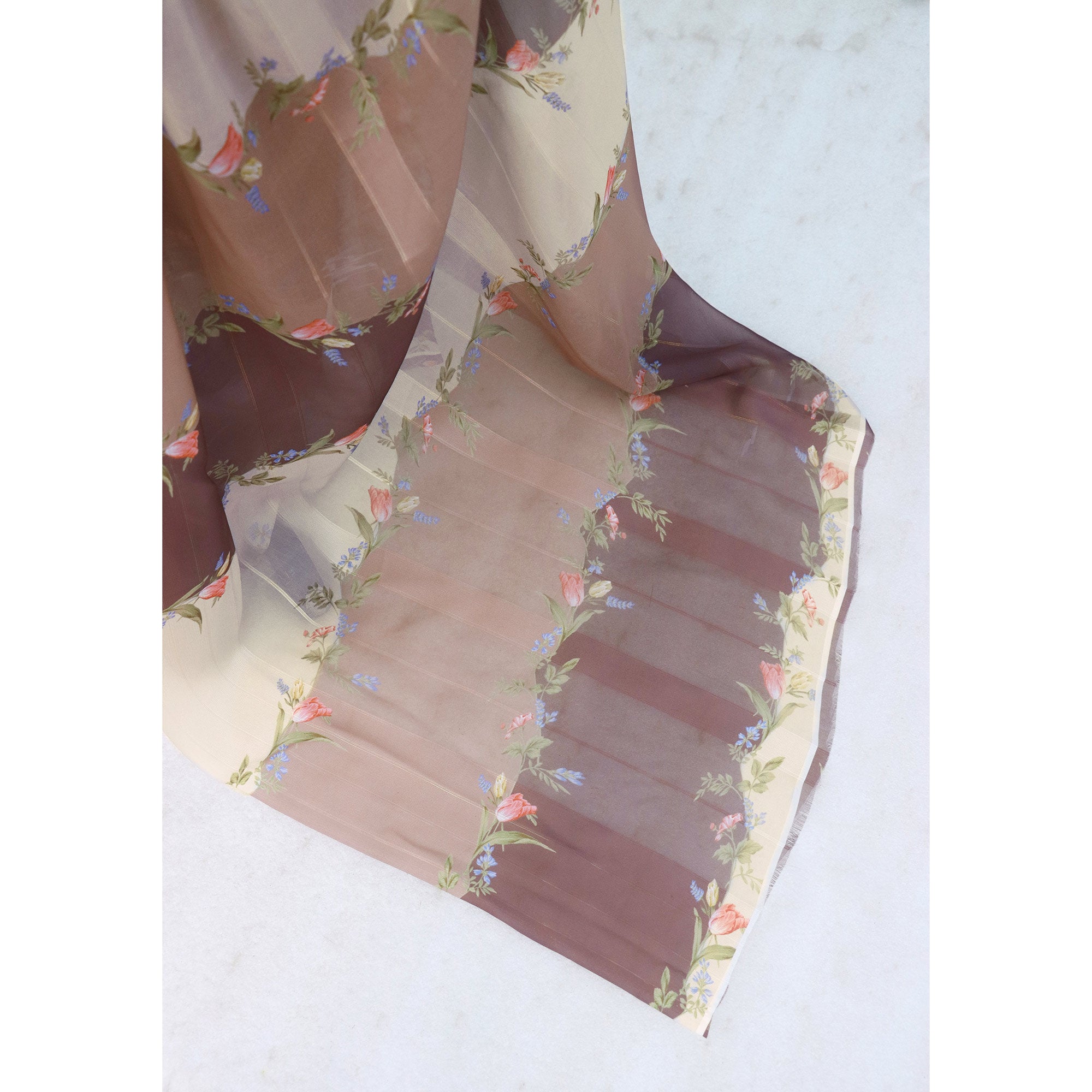 Brown Bloom Floral Digital Printed Georgette Saree Accentuated With Graceful Zari Stripes