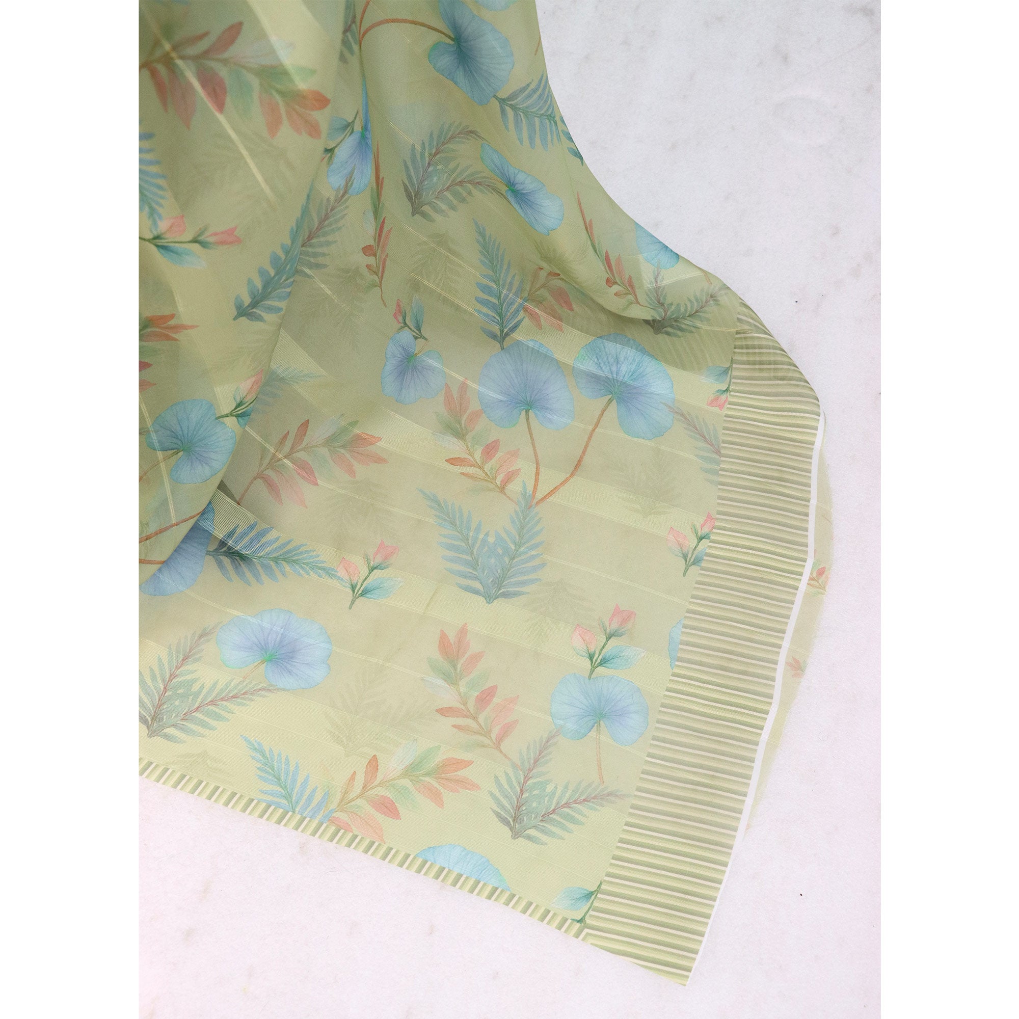 Pista Green Bloom Floral Digital Printed Georgette Saree Accentuated With Graceful Zari Stripes