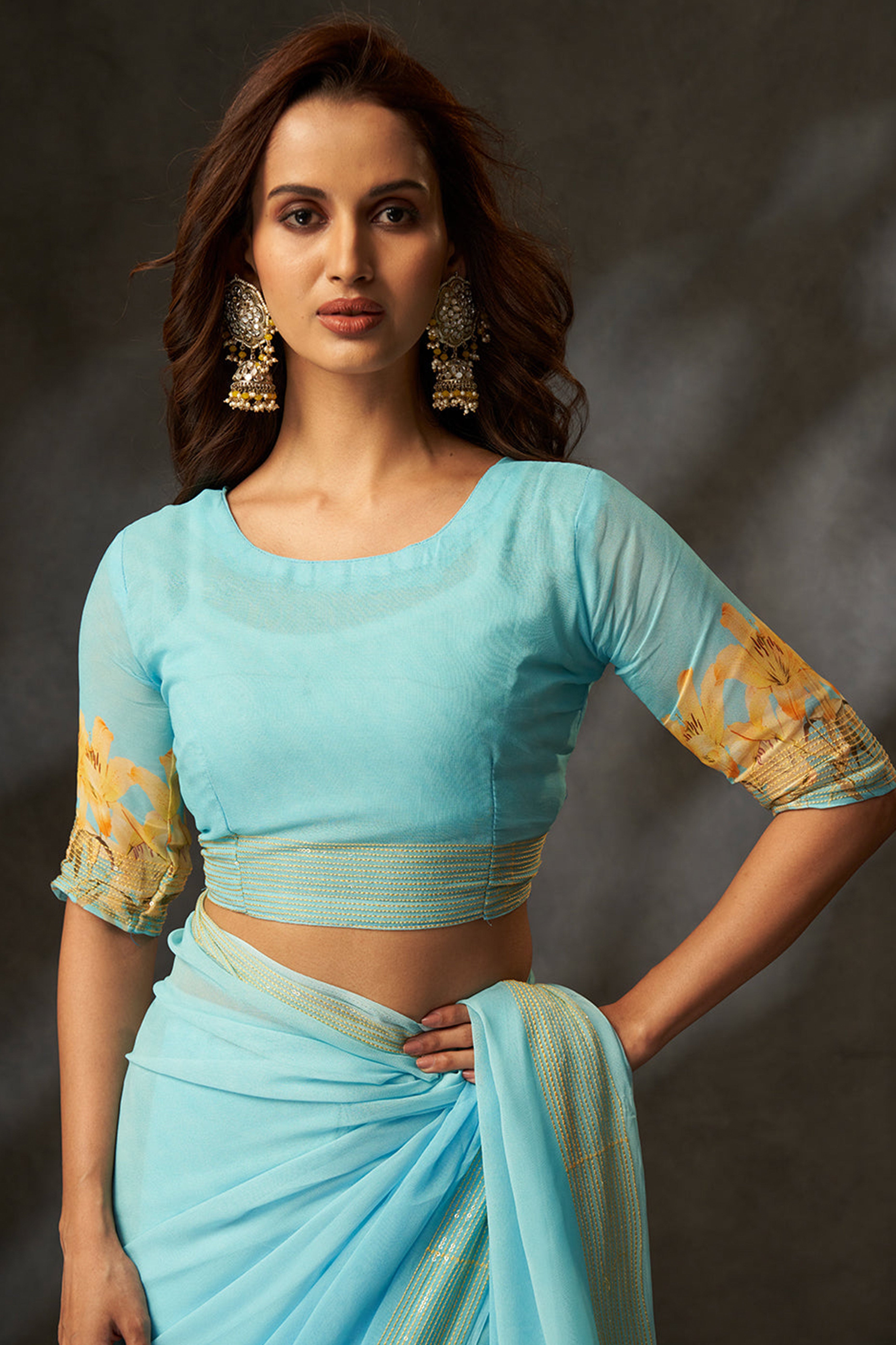 Graceful Sky Blue Floral Digital Print Saree in Georgette With Artistic Crochet Border Work