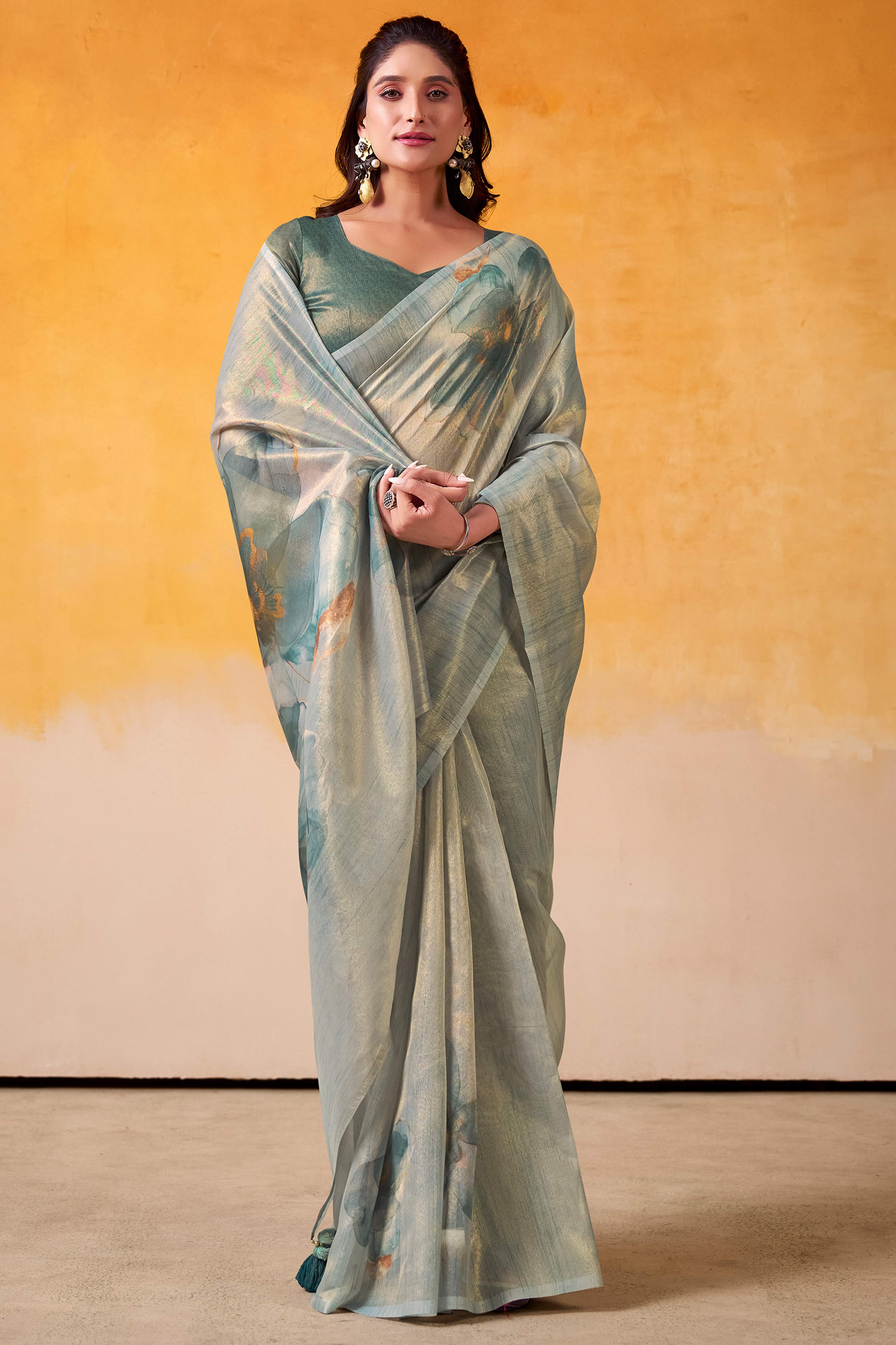 Sophisticated Blue Floral Digital Print Tissue Saree Enhanced With Handmade Tassels