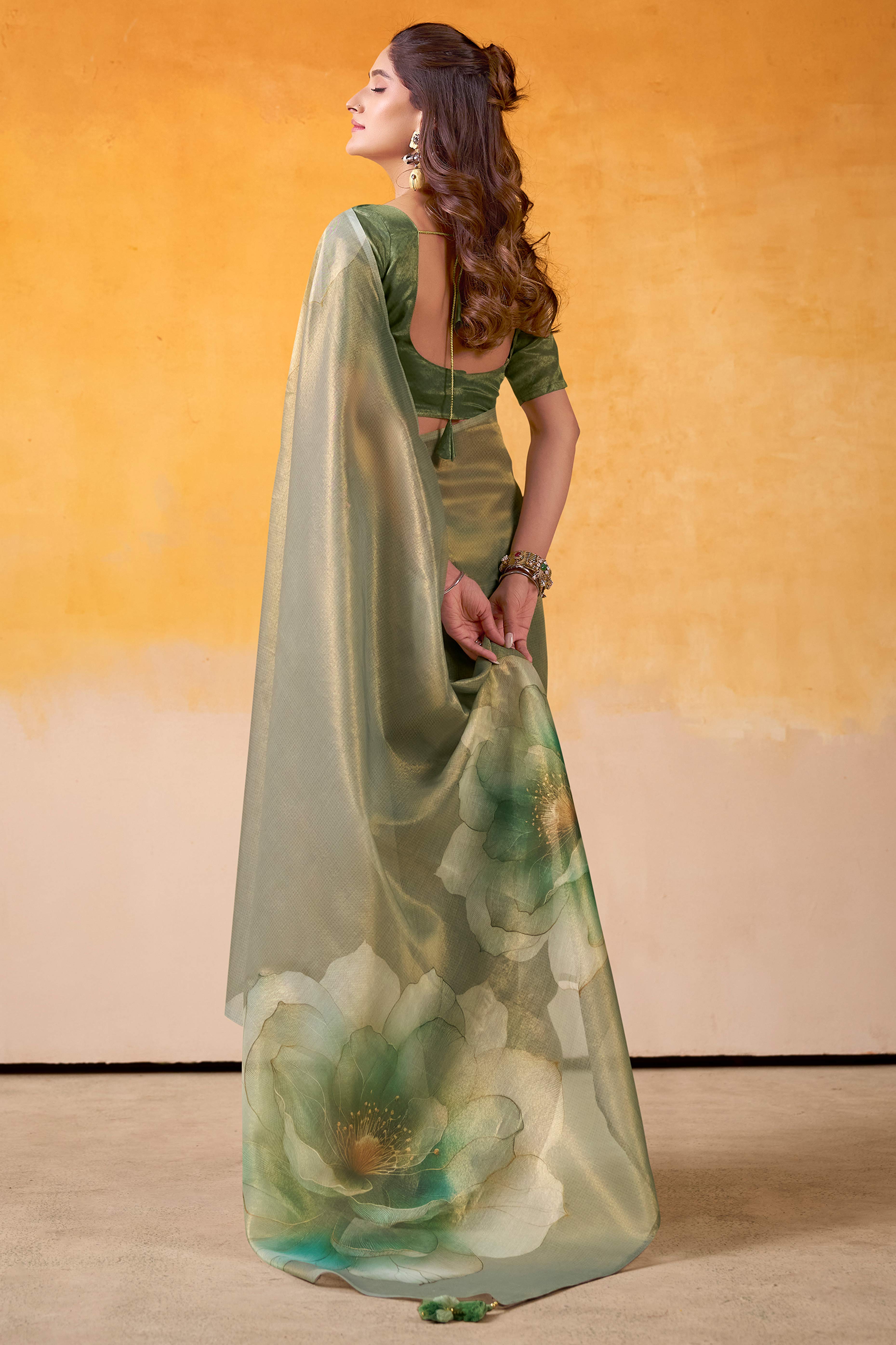 Sophisticated Dusty Green Floral Digital Print Tissue Saree Enhanced With Handmade Tassels