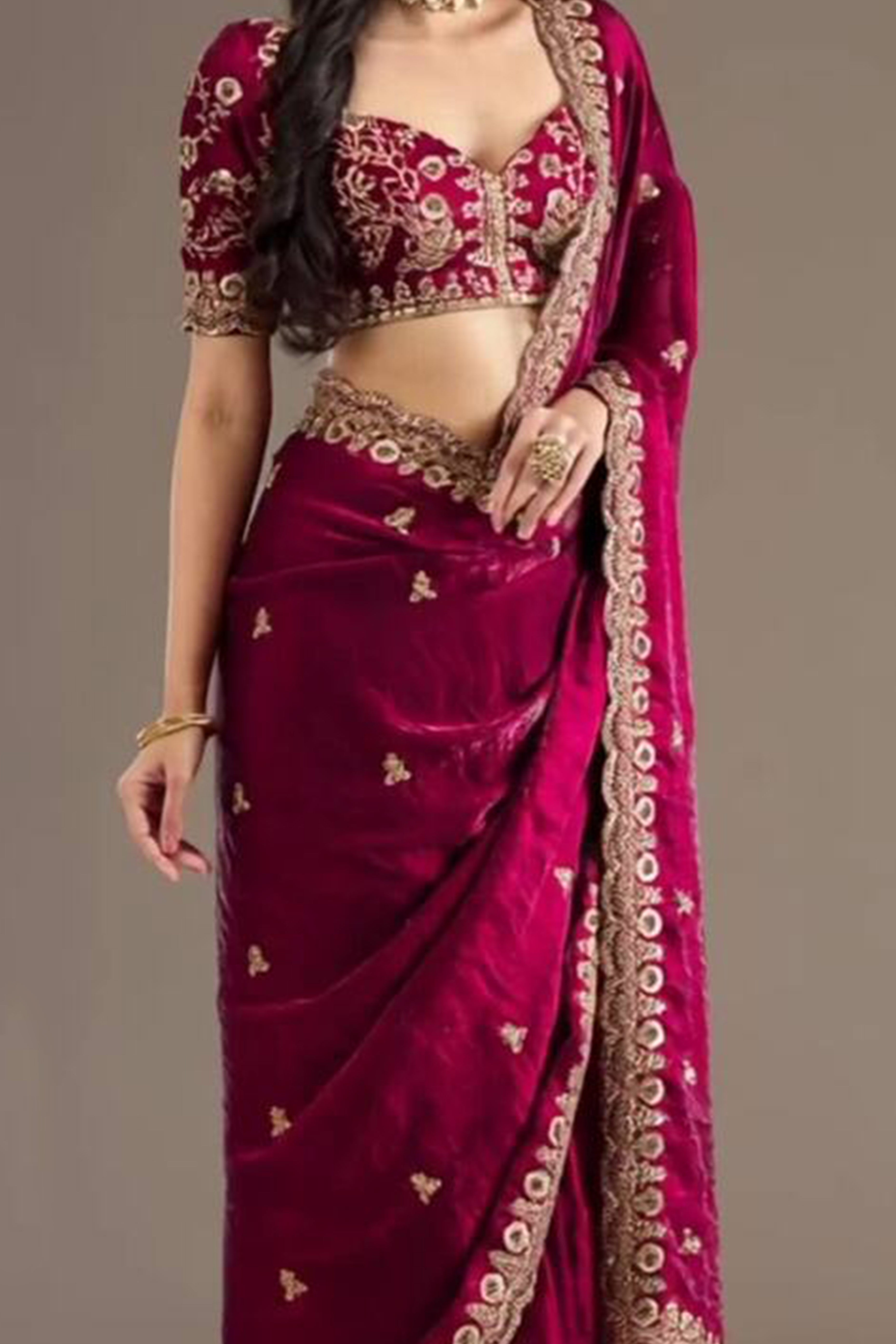 Trendy Rani Pink Fancy Satin Saree Enhanced With Rich Golden Embroidered Design
