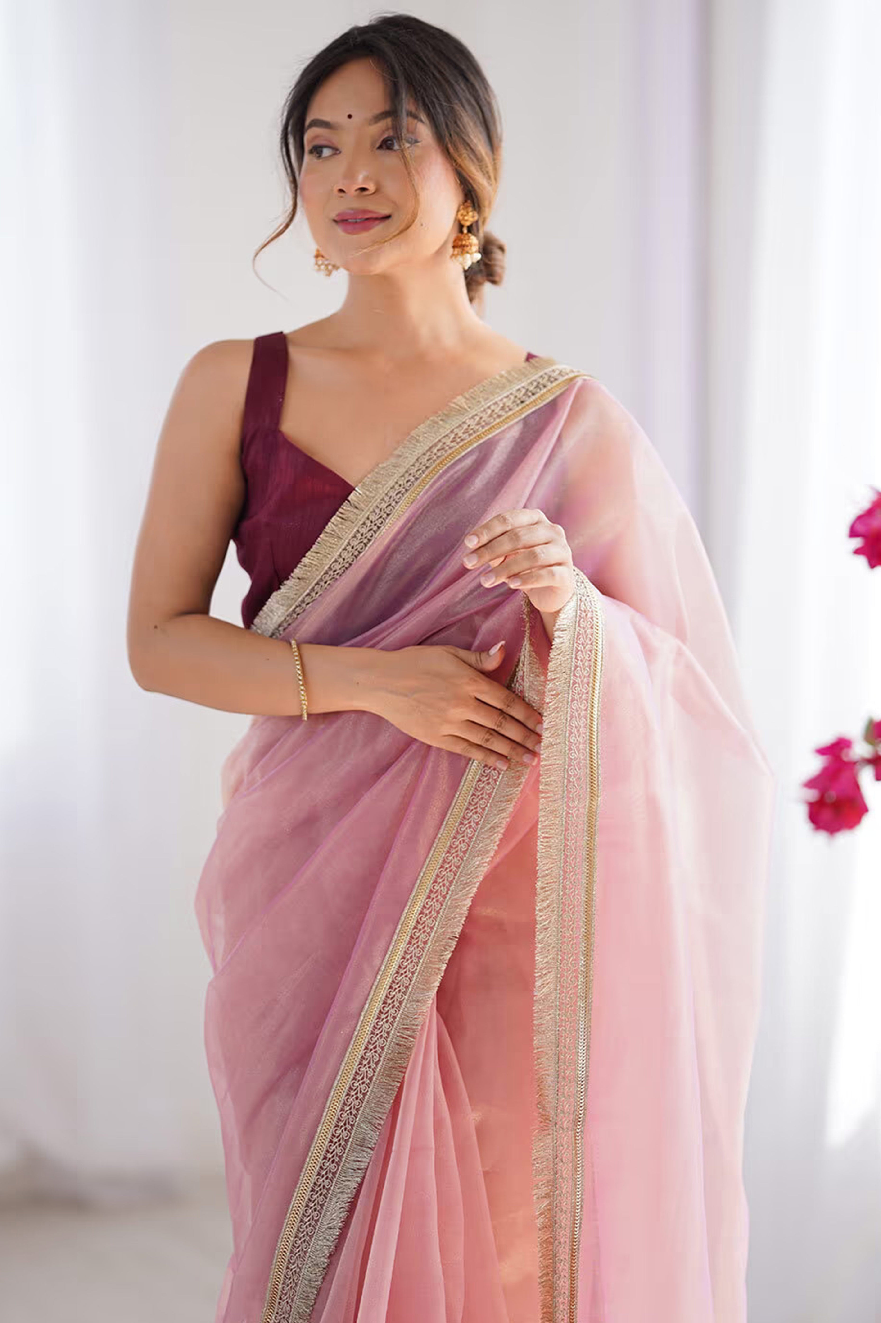Feminine Rose Pink Solid Net Saree with Sophisticated Lace Border Work