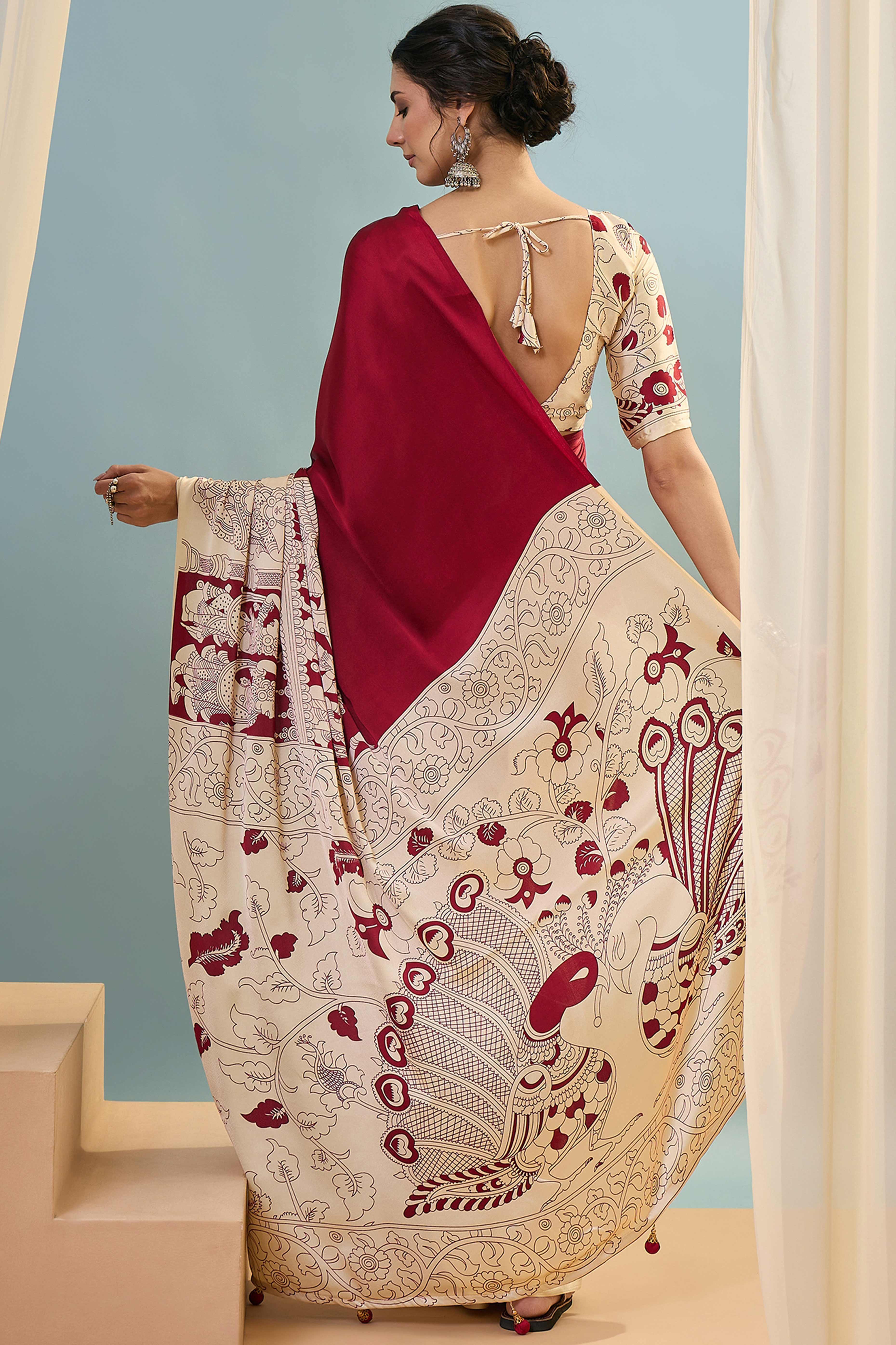 Red Kalamkari Style Modal Satin Saree Featuring Intricate Artistic Prints