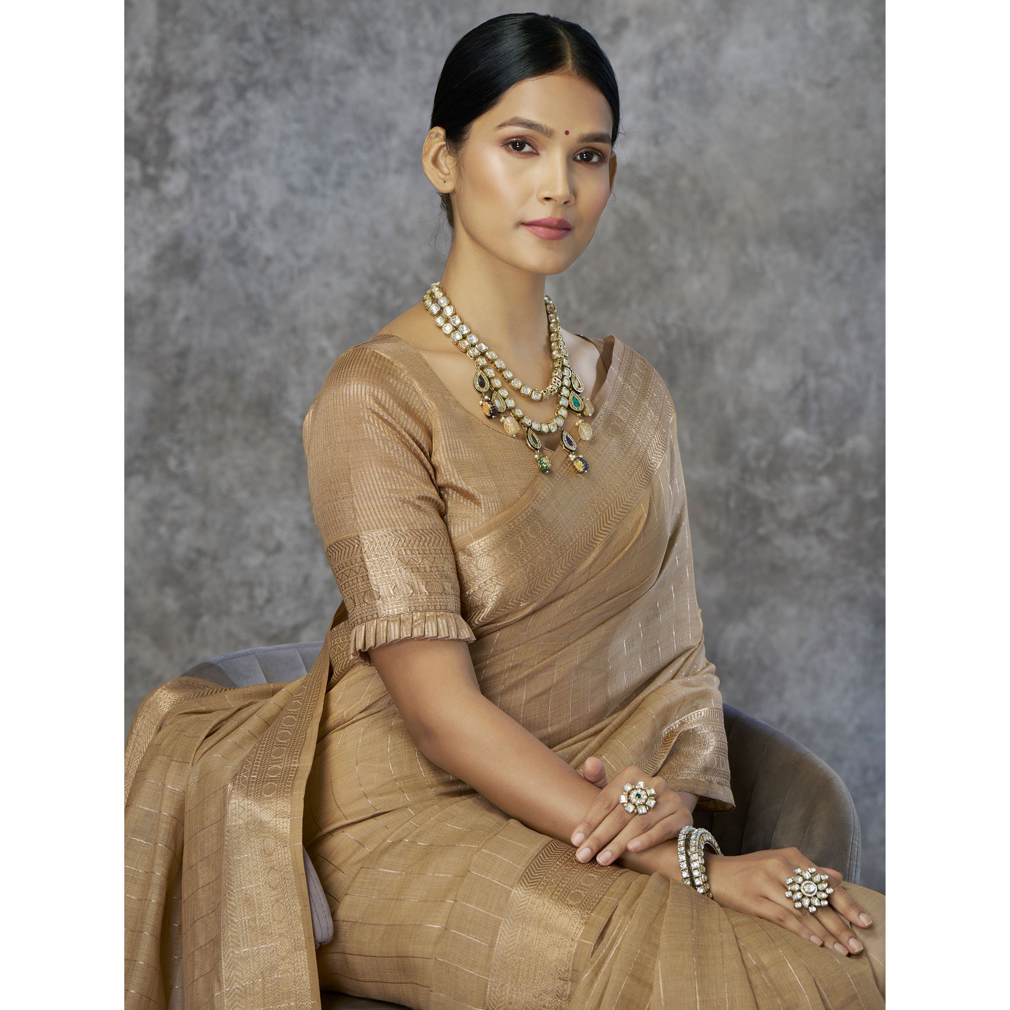 Chikoo Woven Cotton Silk Saree With Tassels