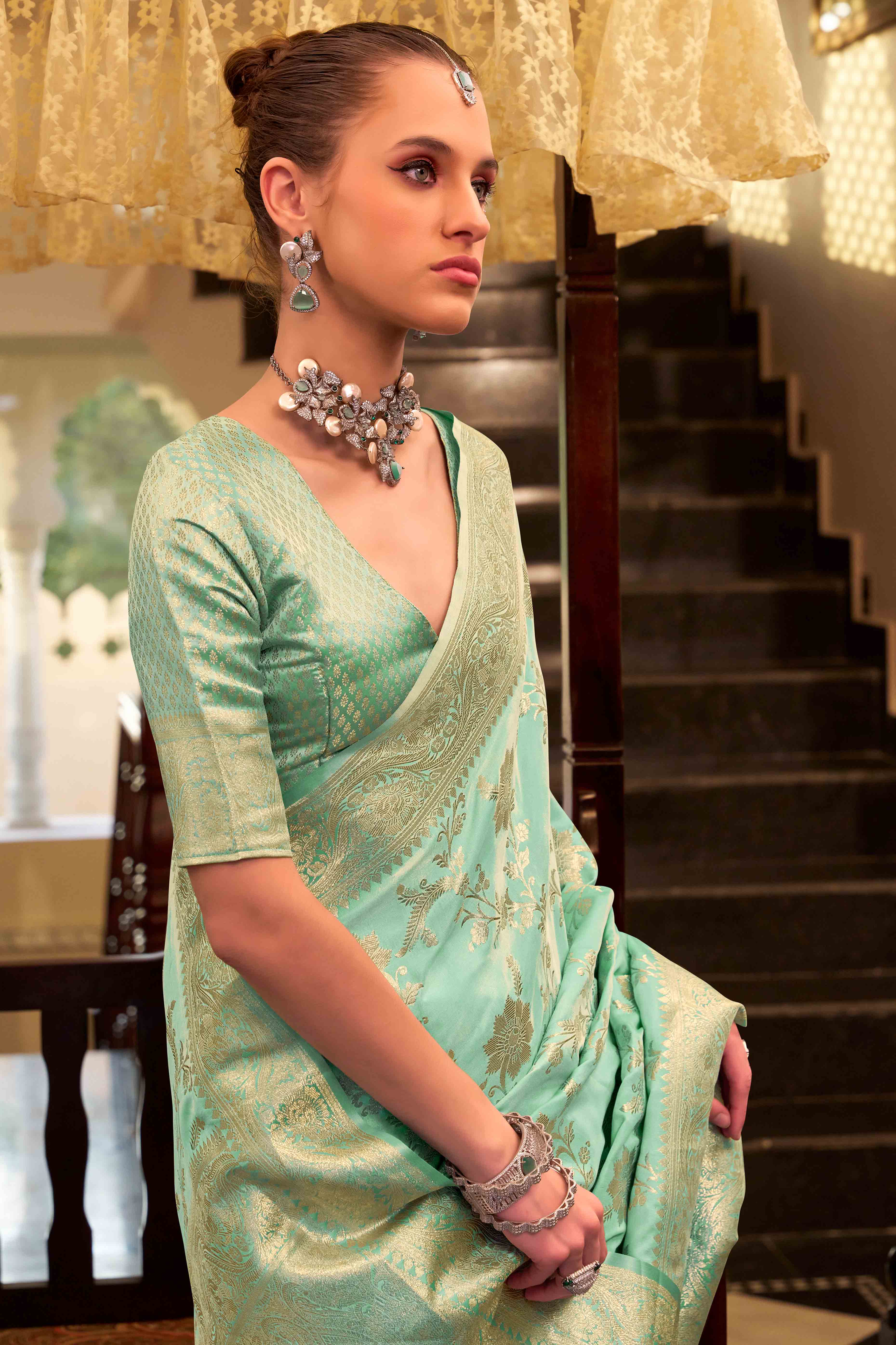 Mint Green Soft Satin Saree Featuring Exquisite Zari Weaving Work