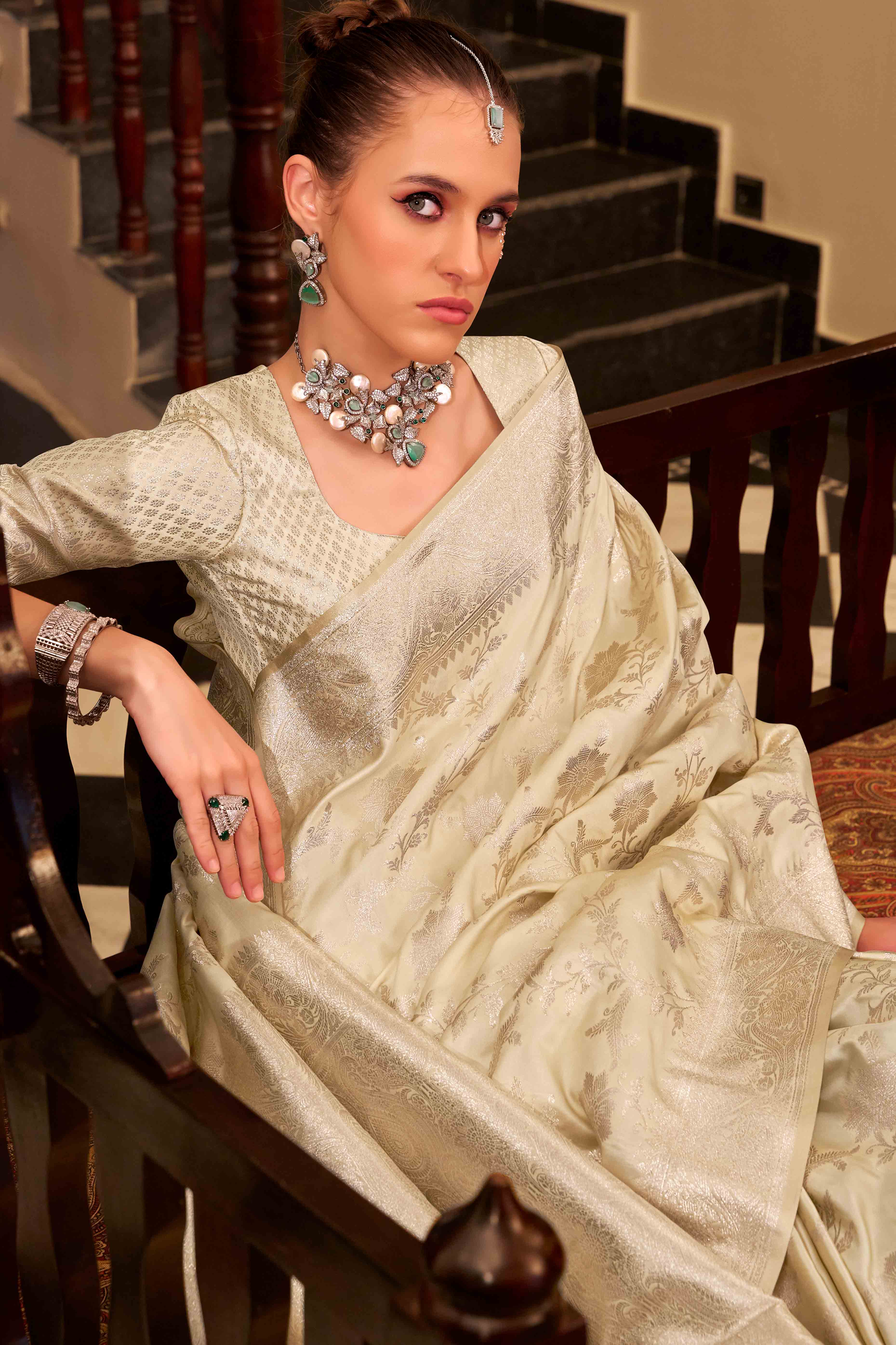 Off White Soft Satin Saree Featuring Exquisite Zari Weaving Work