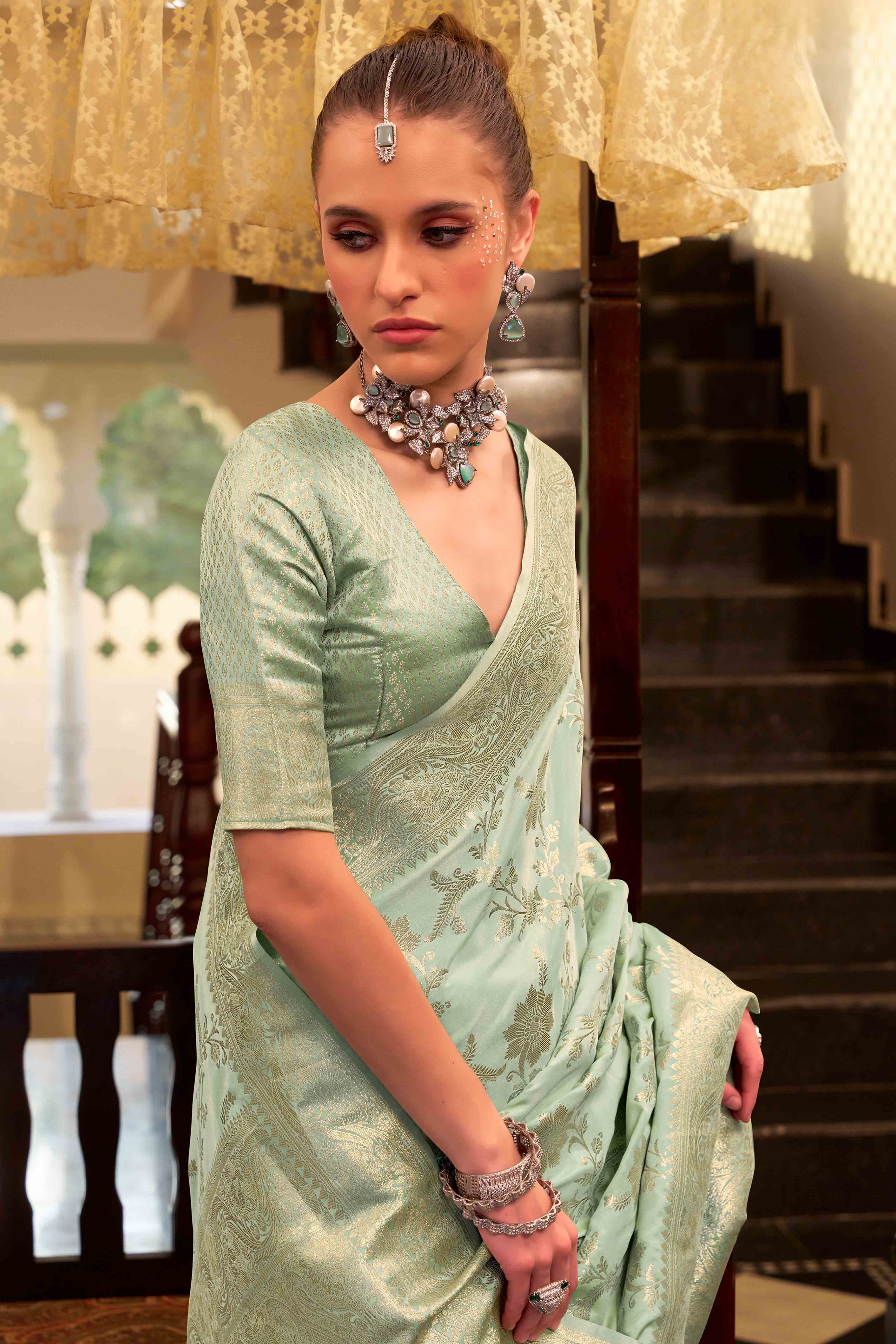 Sea Green Soft Satin Saree Featuring Exquisite Zari Weaving Work