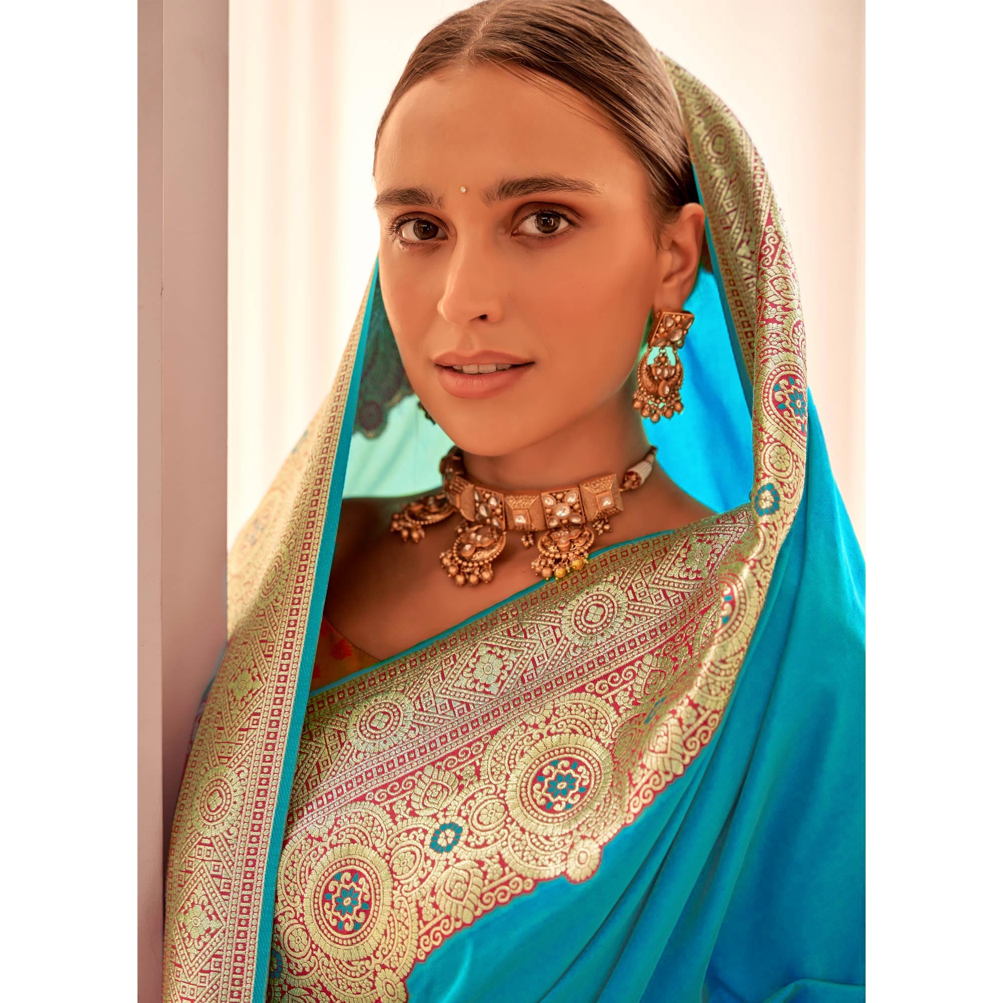 Blue Floral Woven Banarasi Silk Saree With Tassels