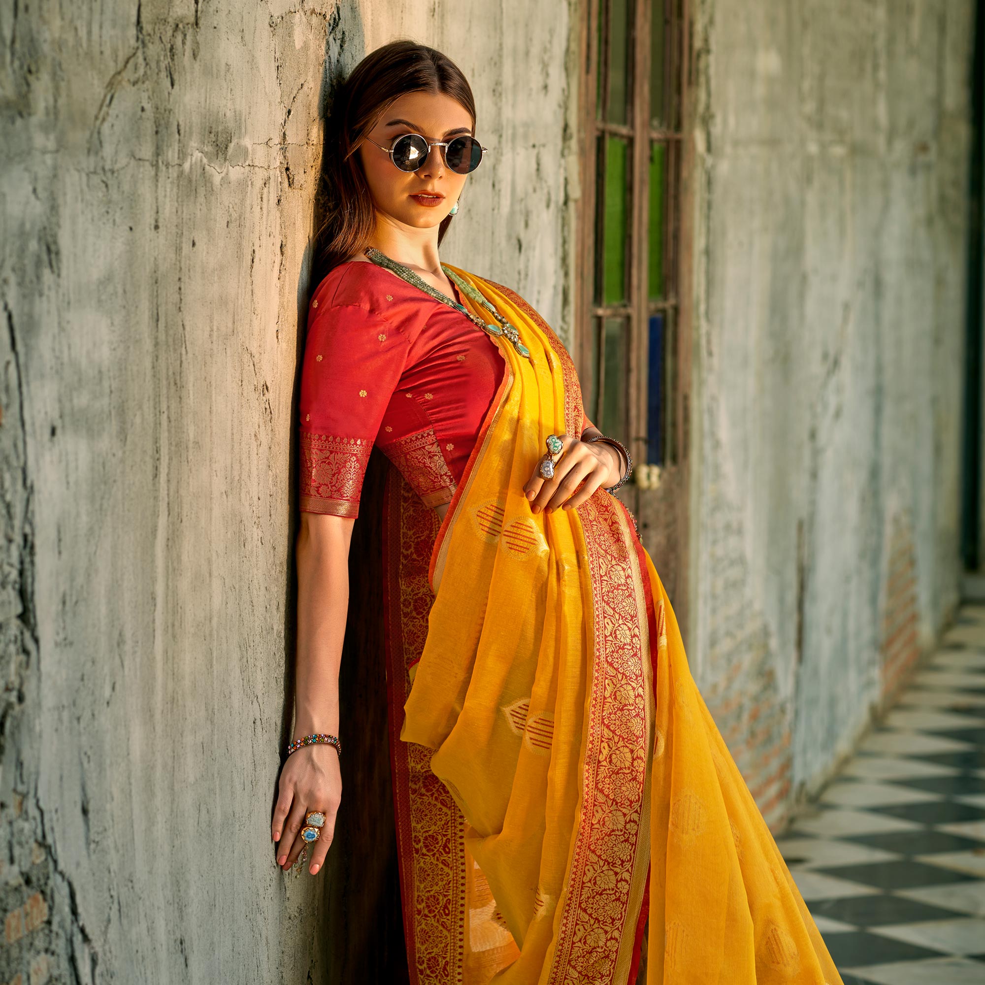 Yellow Floral Woven Tissue Silk Saree With Tassels