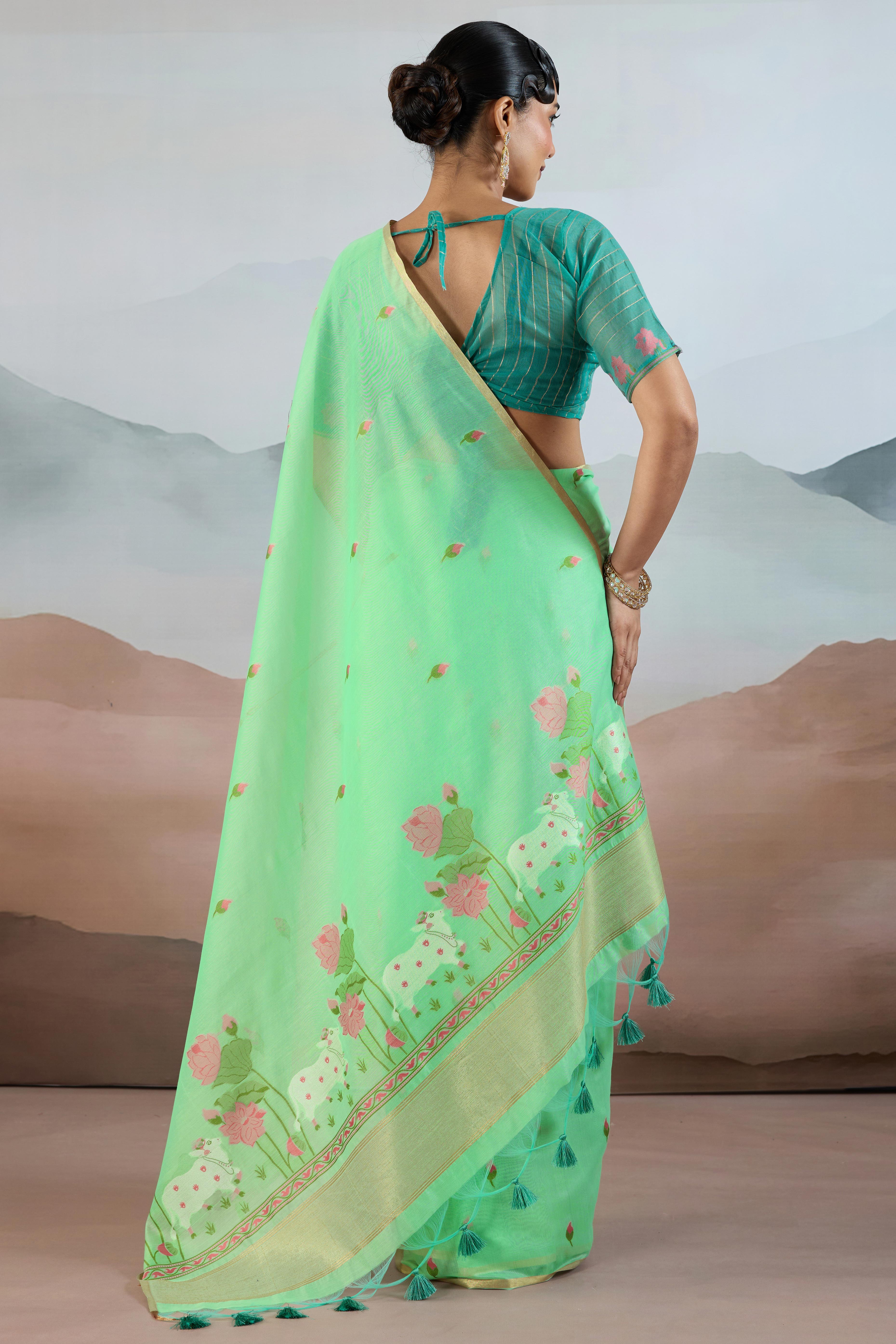 Trendy Sea Green Cotton Blend Weaving Saree Showcasing Floral & Animal Motif & Classic Tassel Pallu
