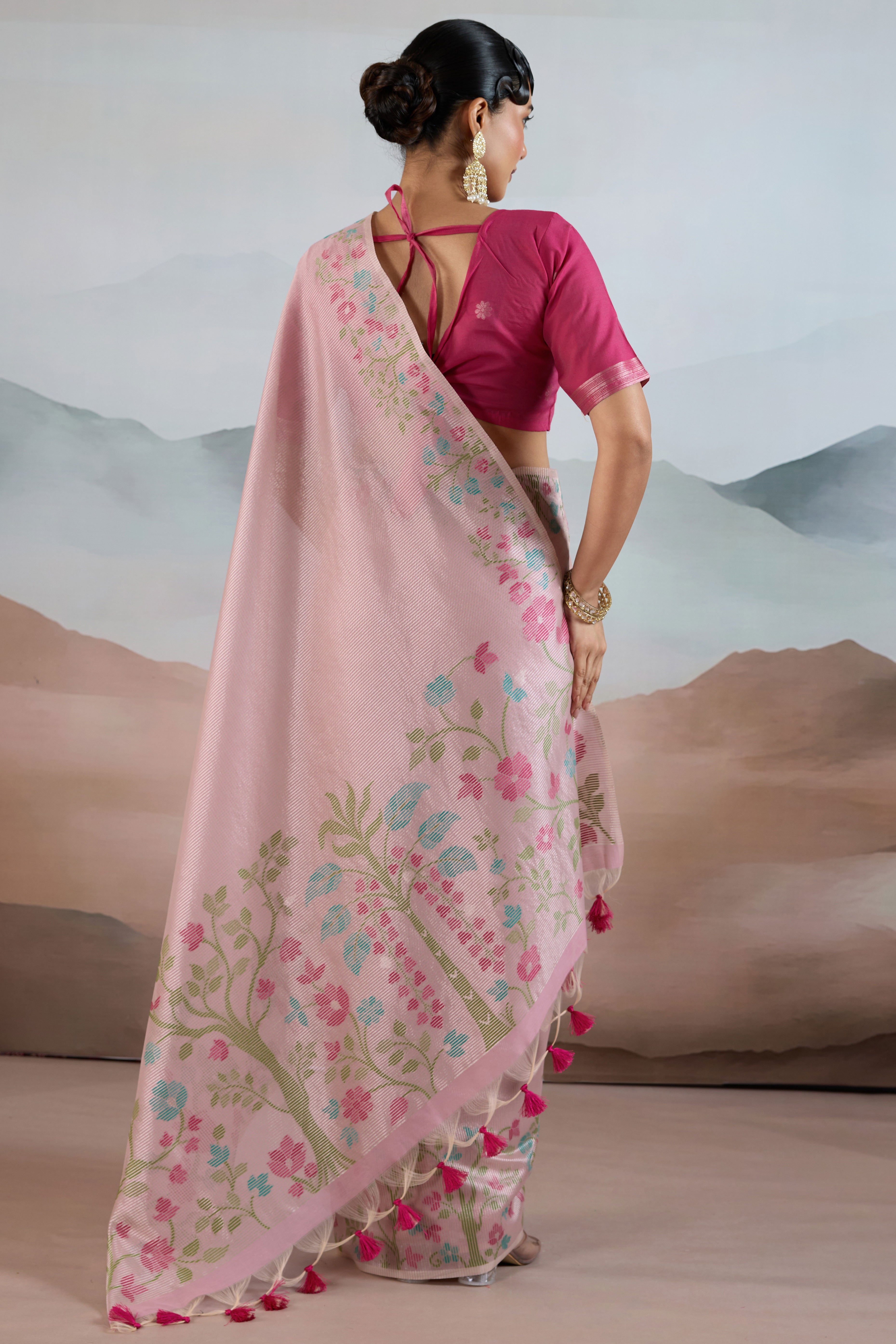Pink Tissue Silk Saree Showcasing Floral & Striped Weaving With Tassel Adornment