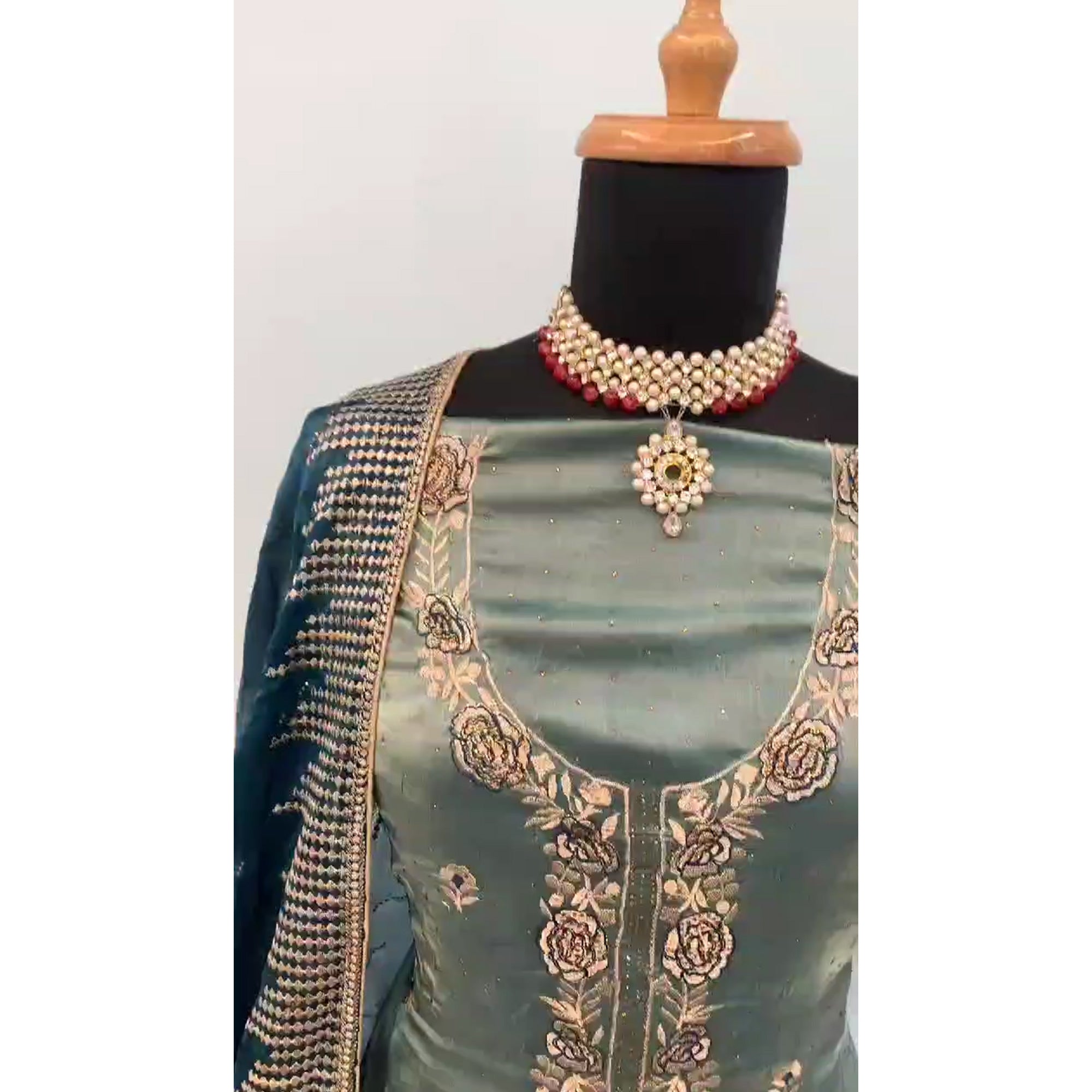 Turquoise Floral Embroidery With Swarovski Work Jimmy Choo Tissue Semi Stitched Suit