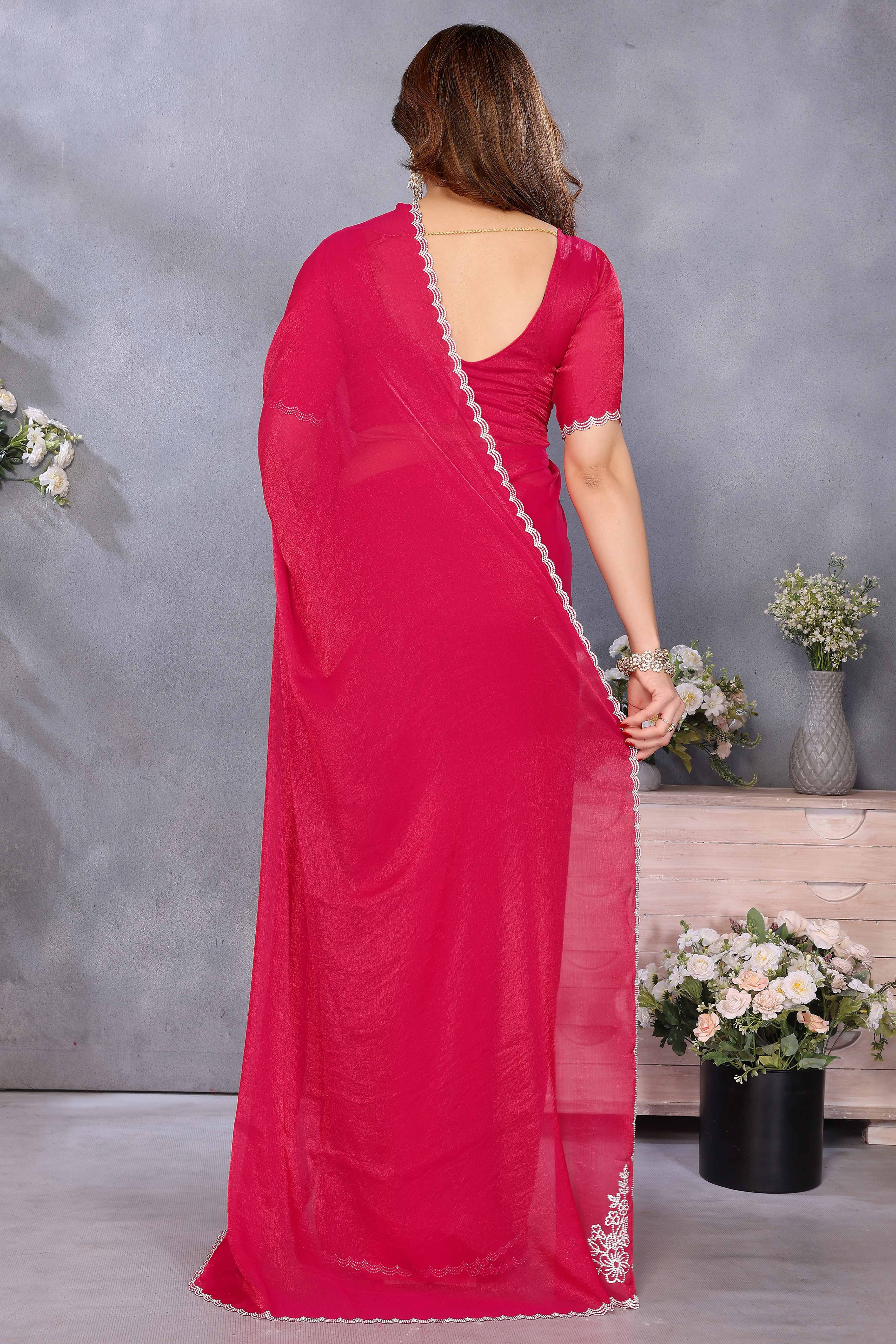 Dark Pink Partywear Chiffon Saree Featuring Intricate Swarovski Stone Embellishment