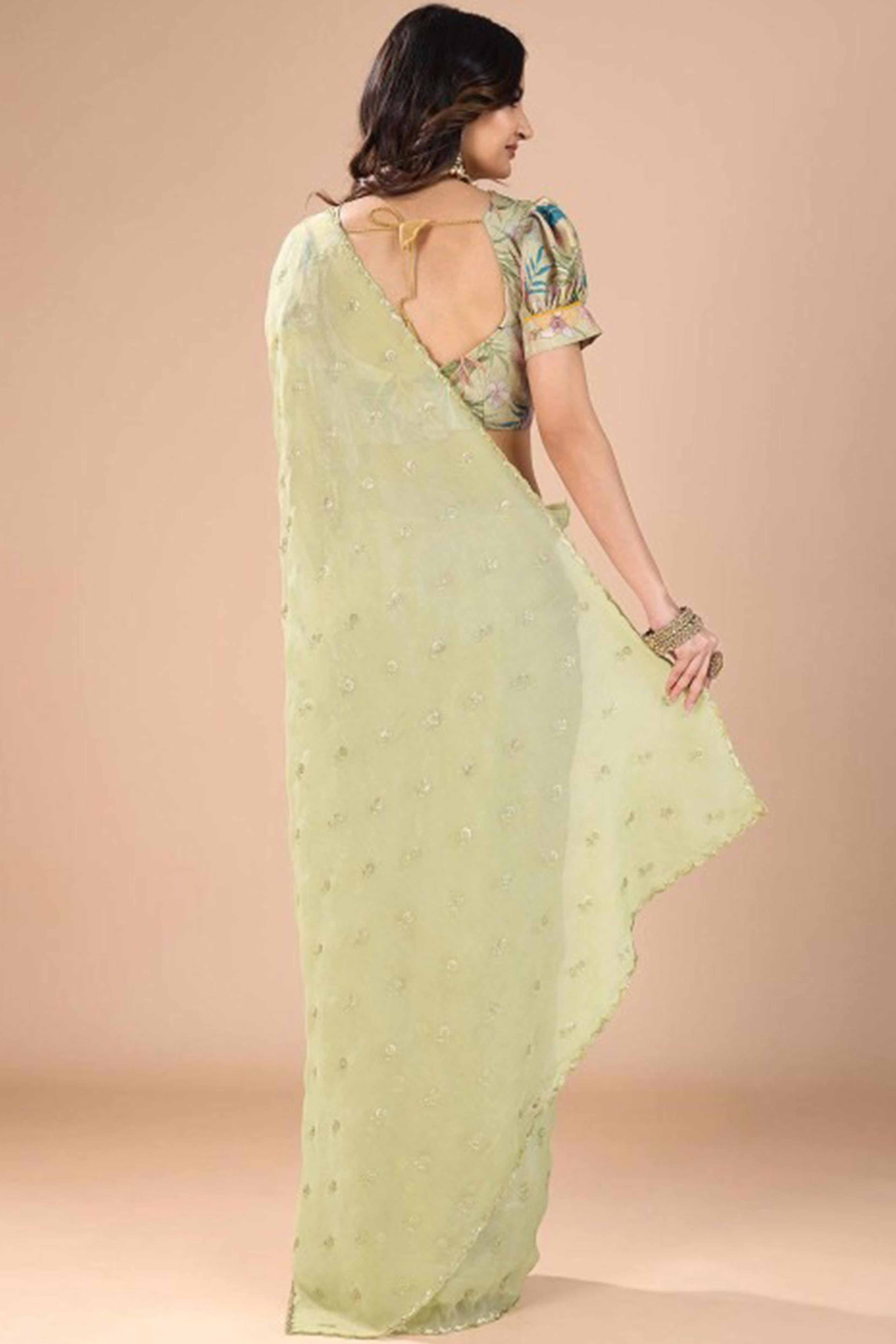 Green Crunchy Saree Adorned With Floral Sequins Embroidery & Graceful Border Finish