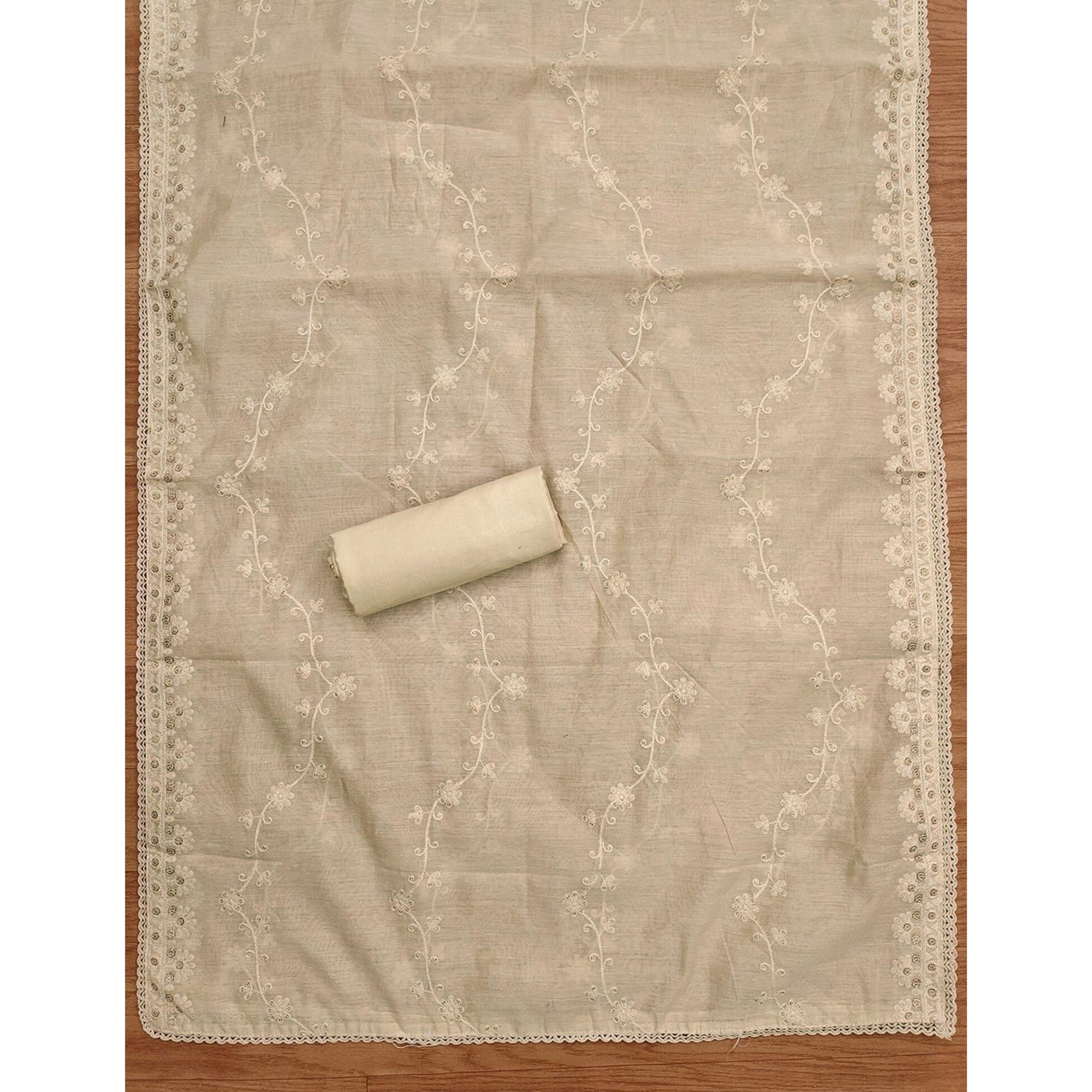 Graceful Cream Chanderi Silk Dress Material Featuring Intricate Lucknowi Embroidery