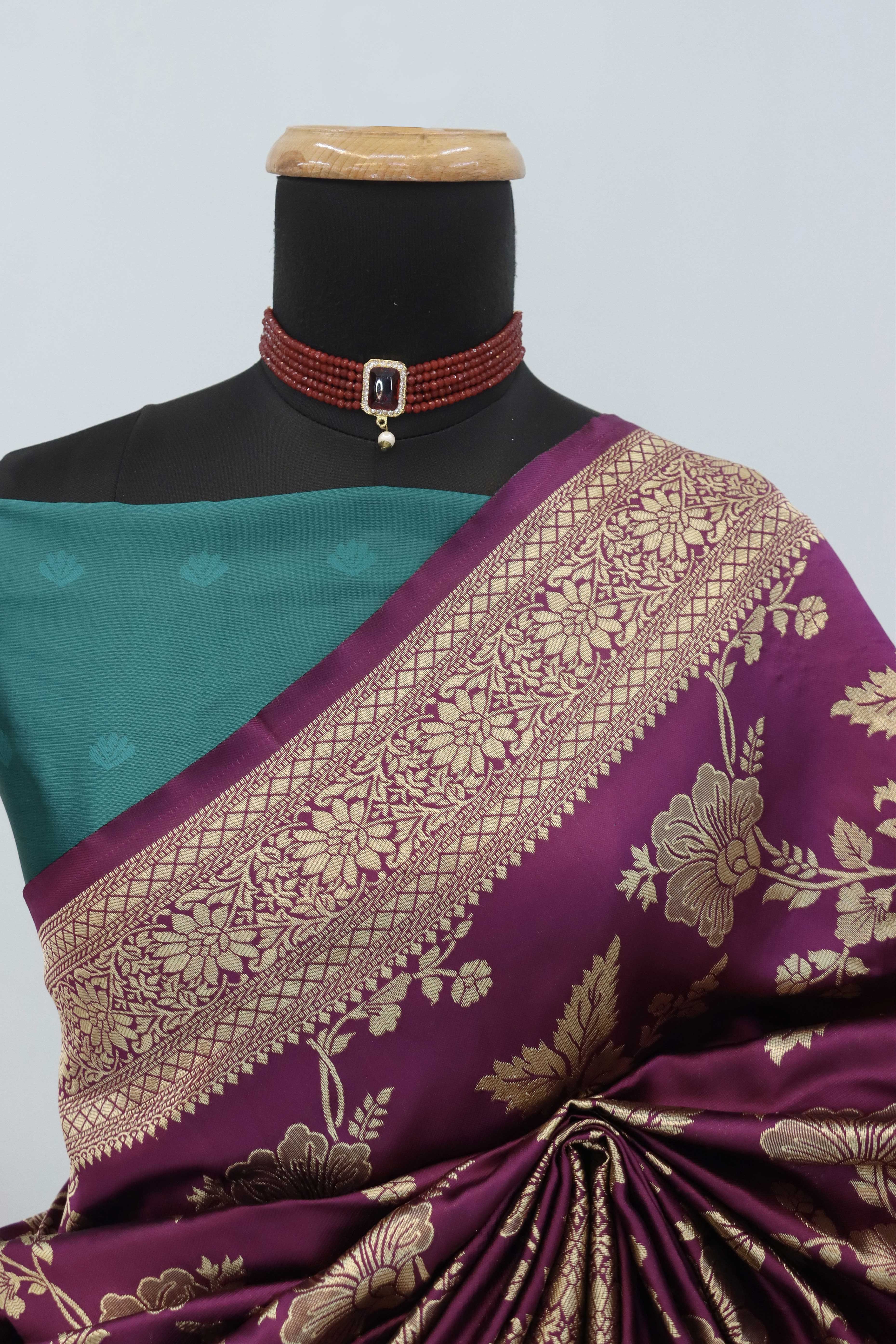 Graceful Wine & Rama Banarasi Silk Saree Featuring Intricate Floral Zari Weaving Work