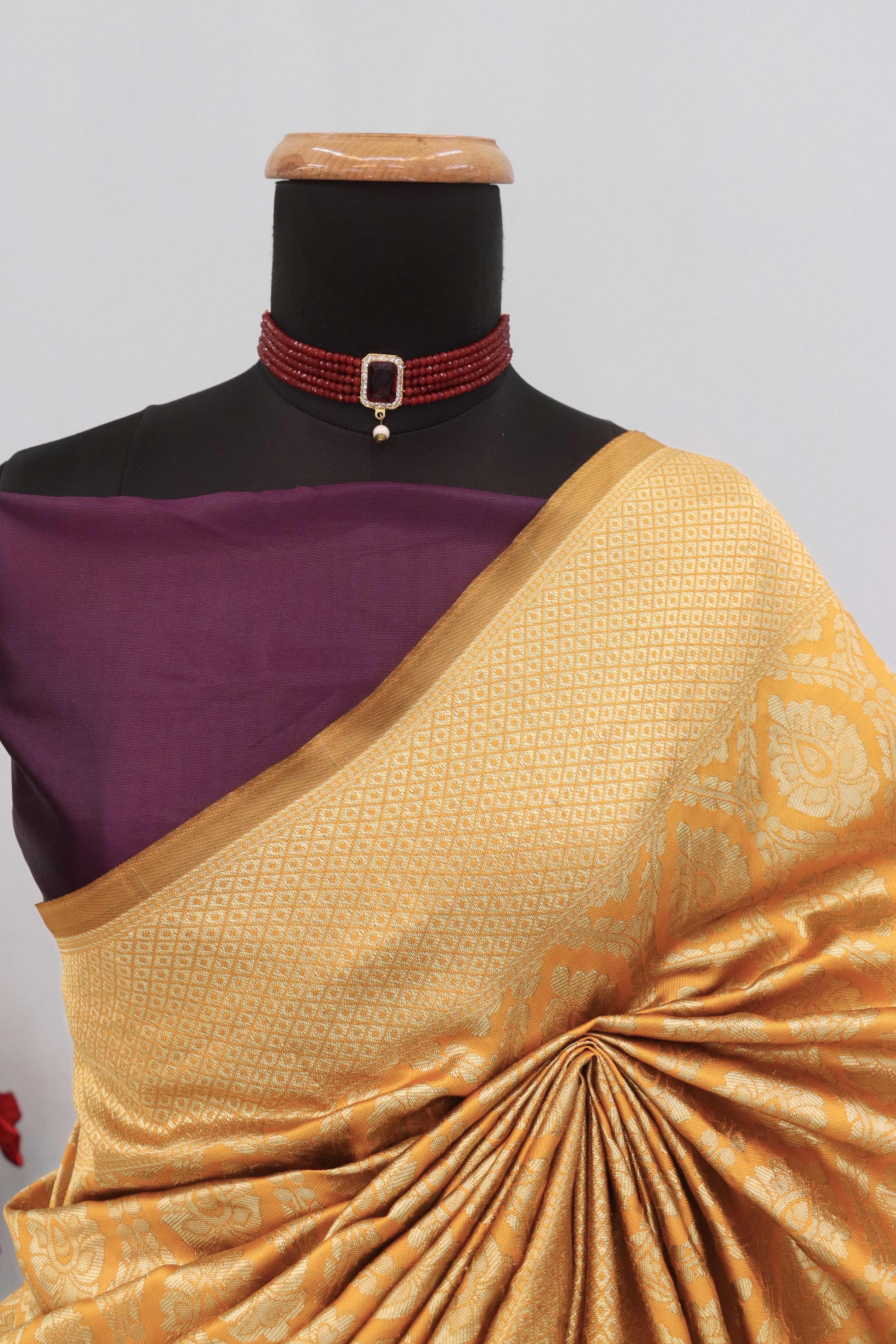 Charming Orange & Purple Banarasi Silk Saree Adorned With Floral Zari Weaving
