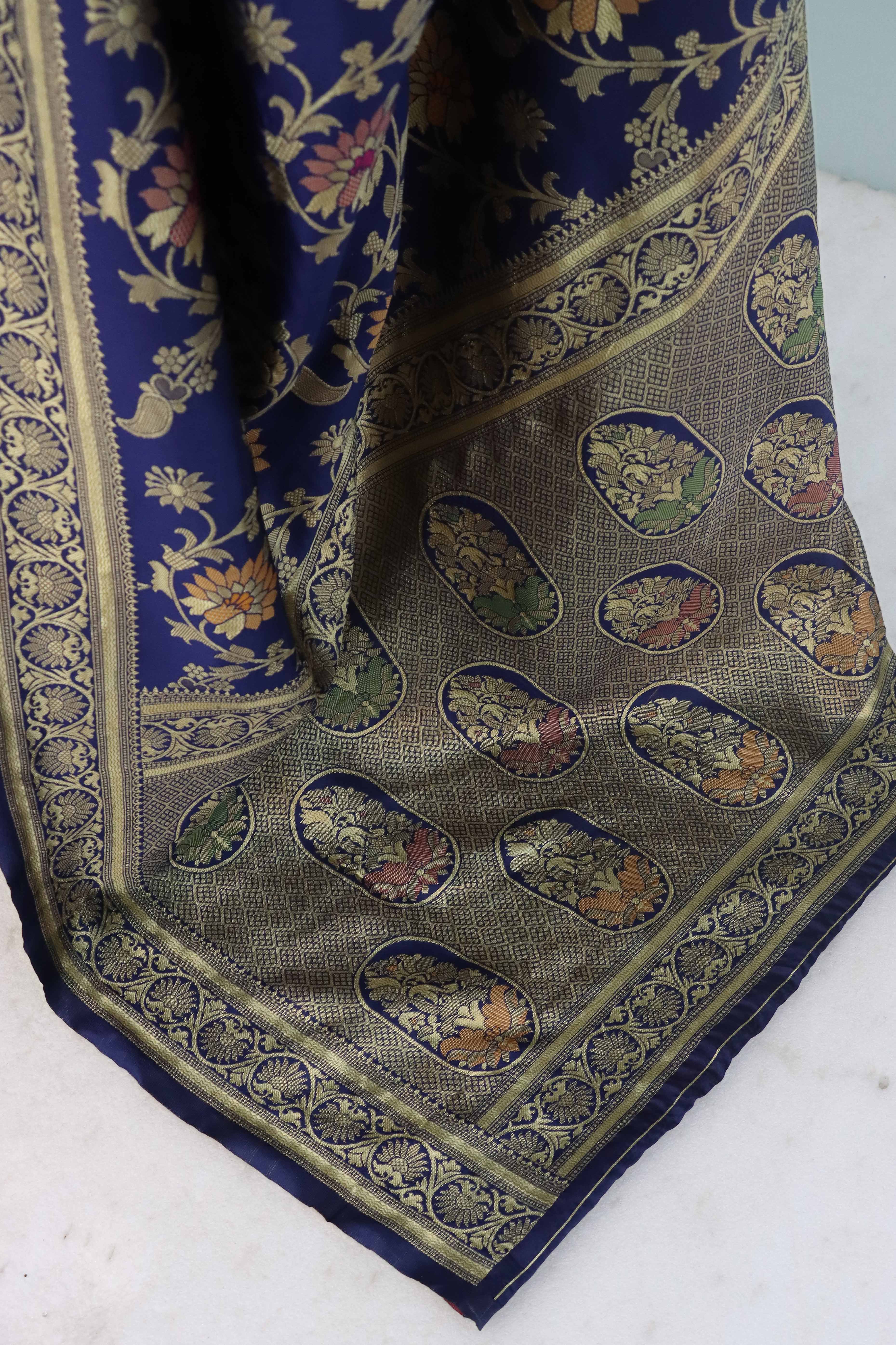 Charming Navy Blue Banarasi Silk Saree Adorned With Floral Zari Weaving
