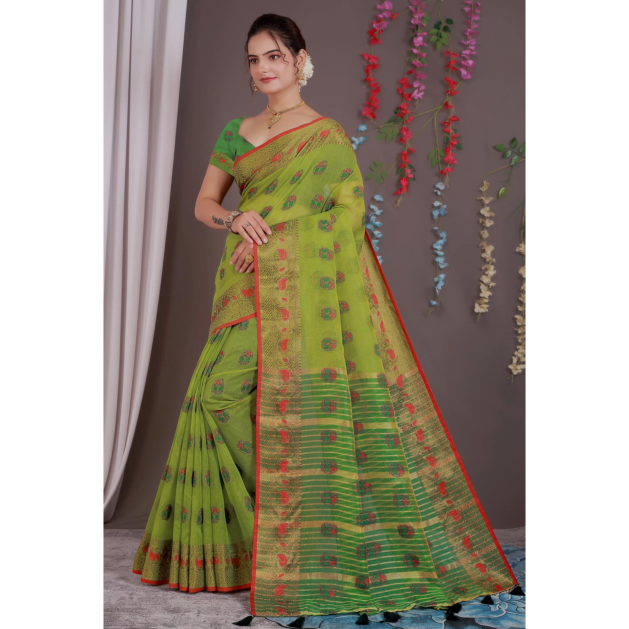 Green Floral Woven Cotton Silk Saree With Tassels